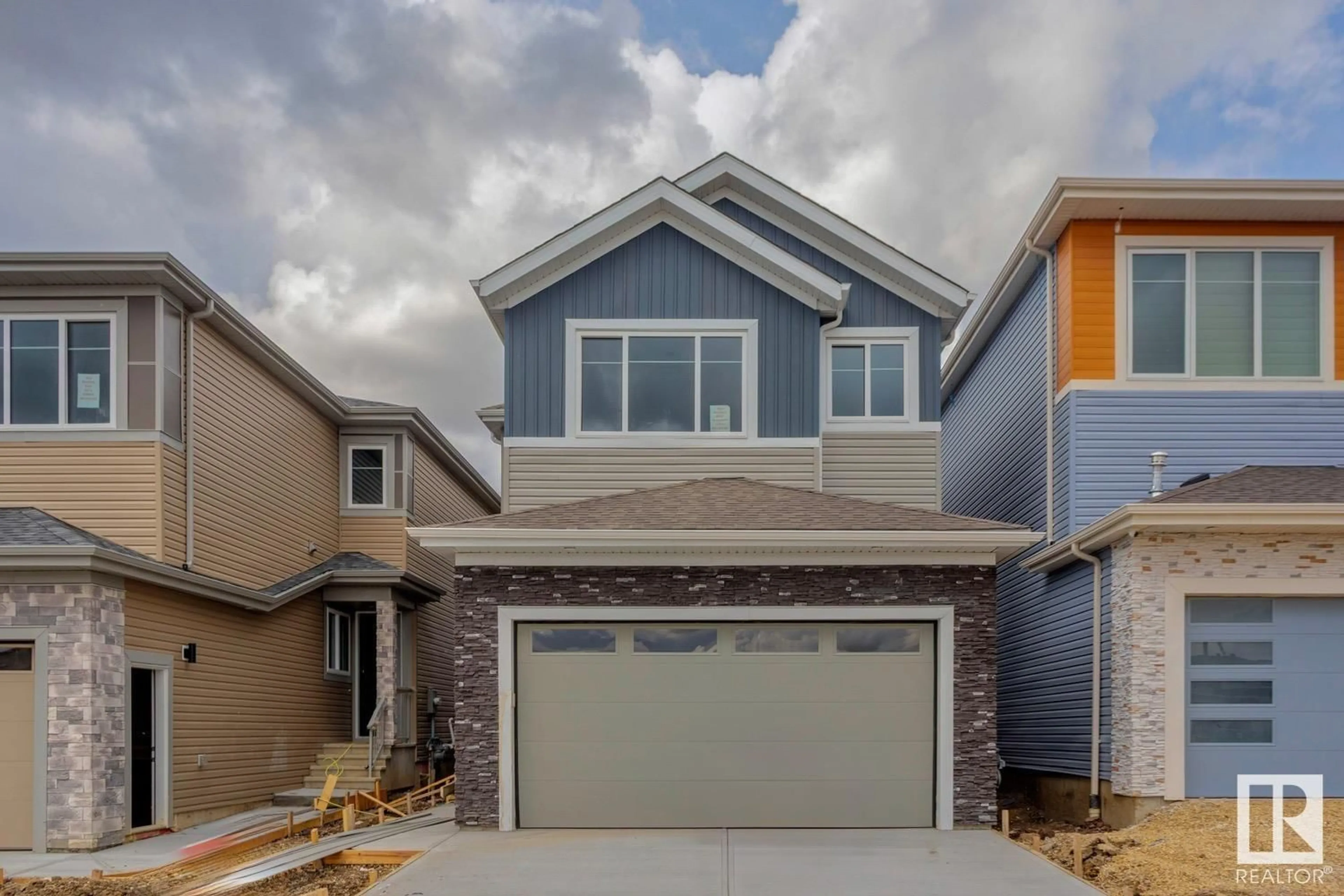 Home with vinyl exterior material, street for 3612 TRIOMPHE BV, Beaumont Alberta T4X3A7
