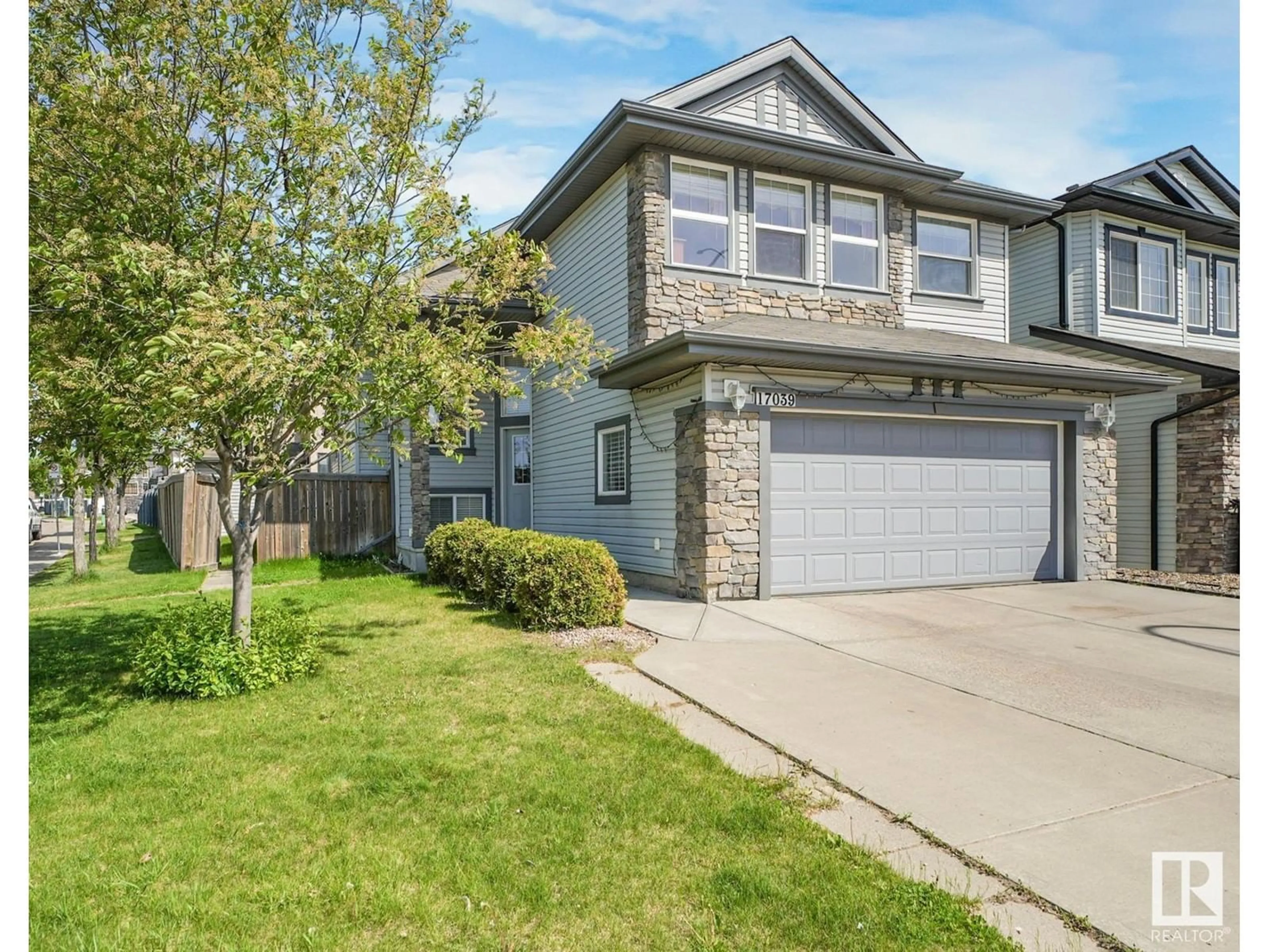 Home with vinyl exterior material, street for 17039 74 ST, Edmonton Alberta T5Z0B6