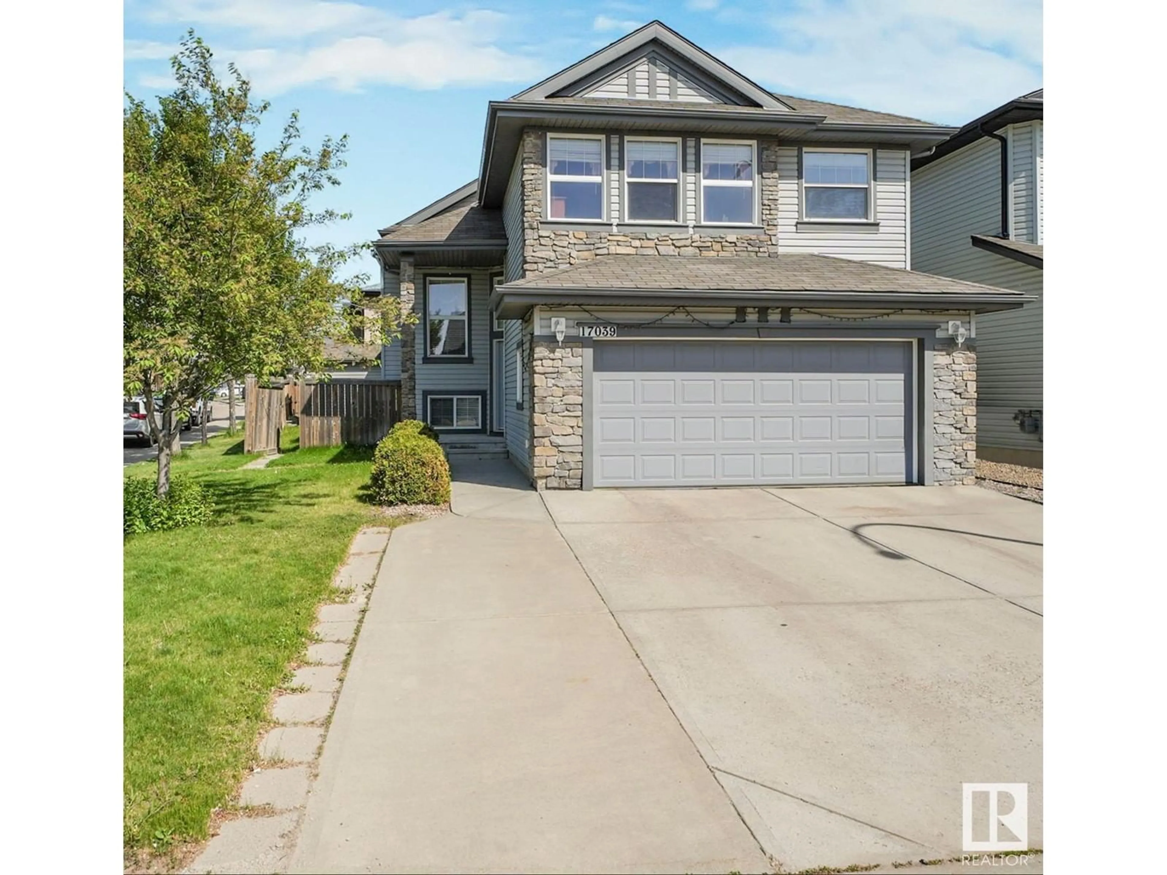 Home with vinyl exterior material, street for 17039 74 ST, Edmonton Alberta T5Z0B6