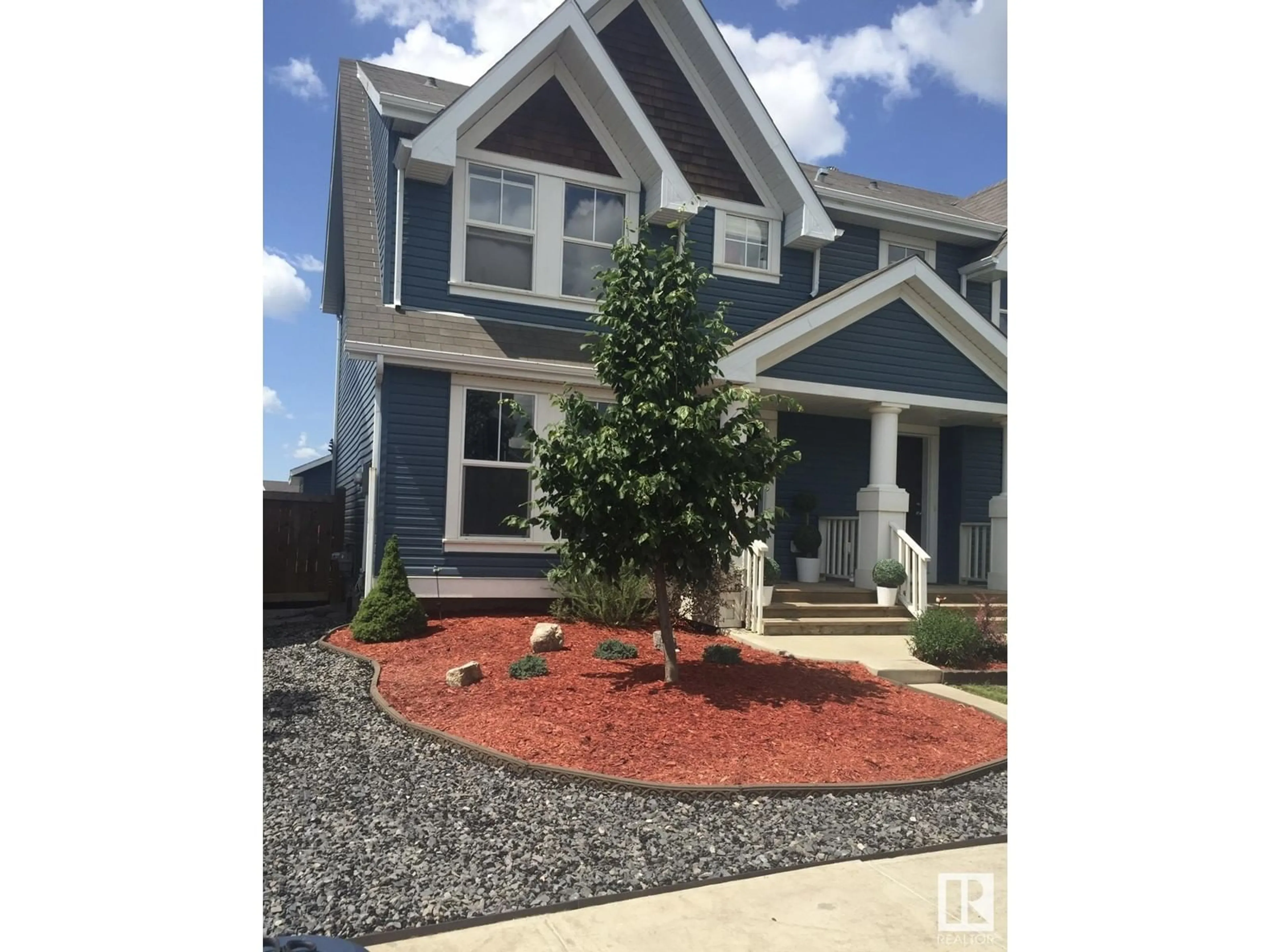 Home with vinyl exterior material, street for SW - 9132 SHAW WY, Edmonton Alberta T6X0S4