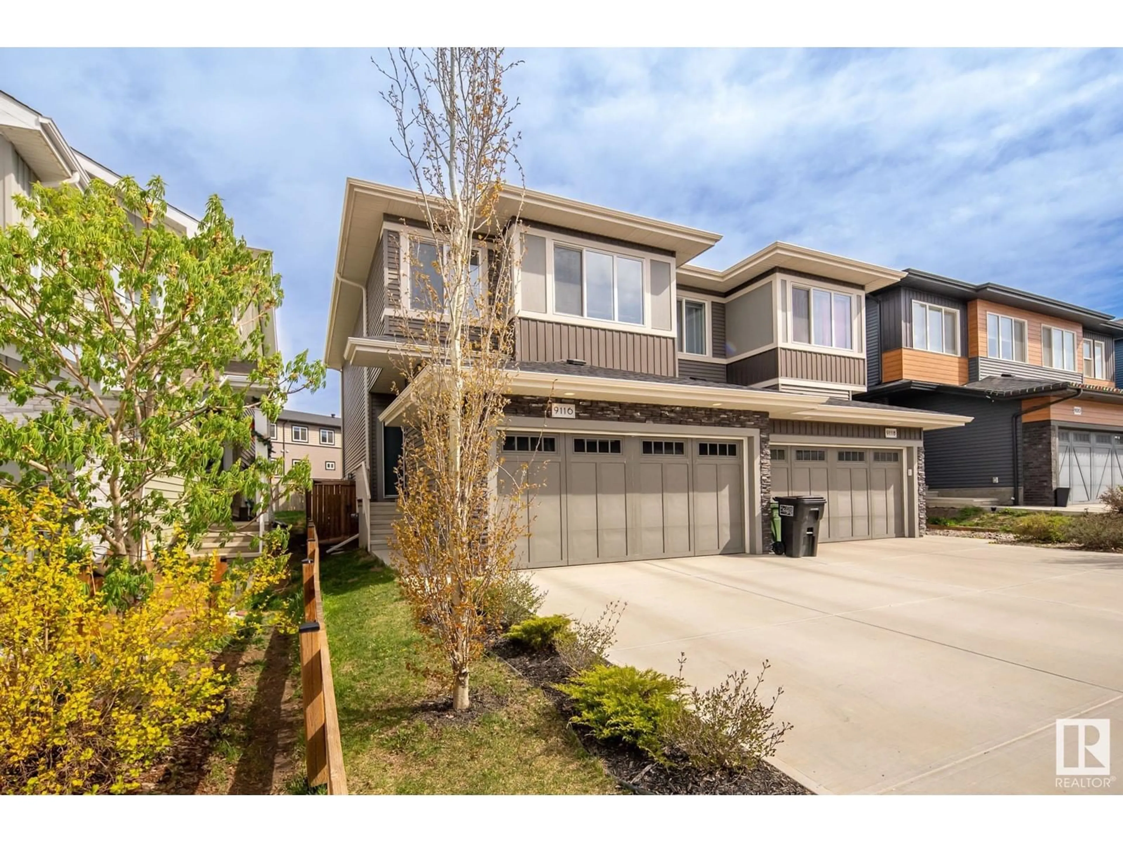 Home with vinyl exterior material, street for 9116 PEAR DR, Edmonton Alberta T6X2N7