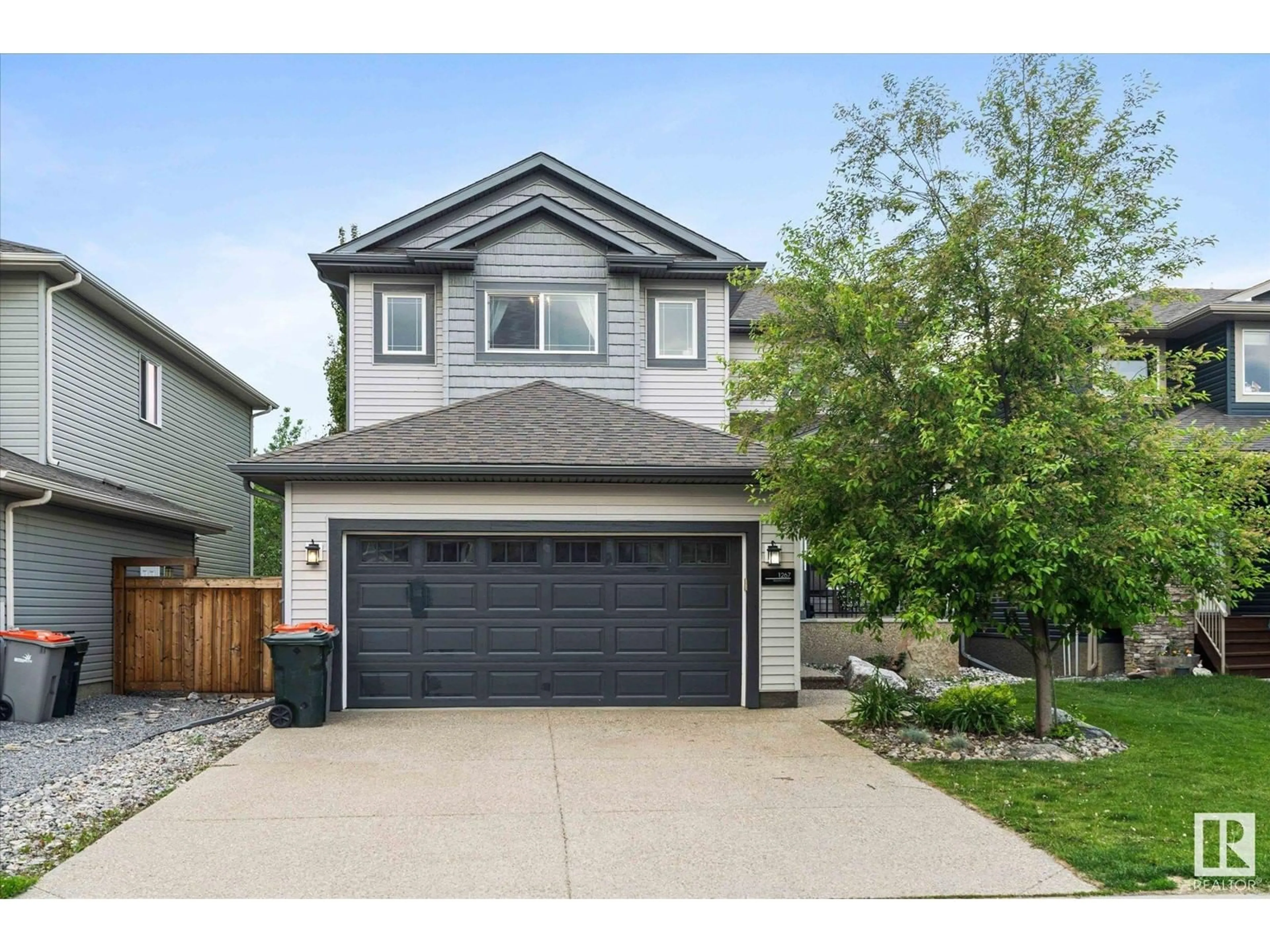 Home with vinyl exterior material, street for 1267 WESTERRA CR, Stony Plain Alberta T7Z0B2