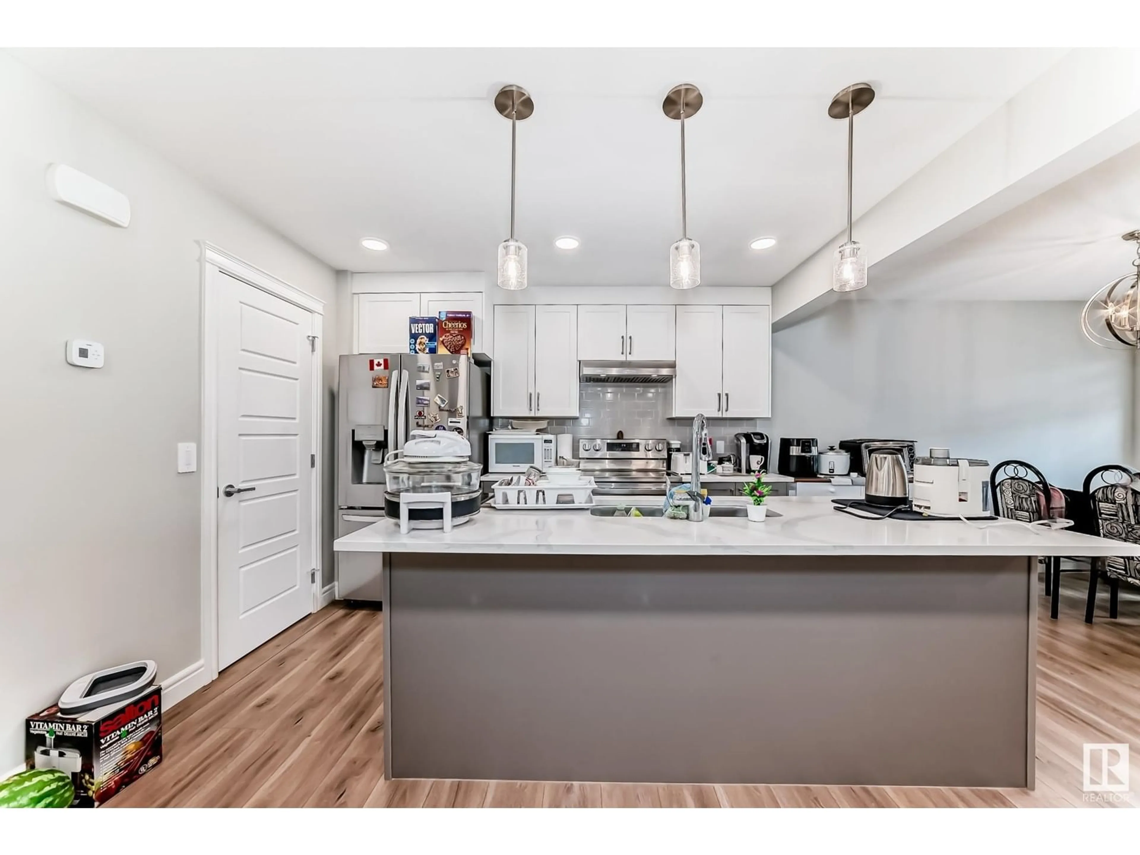 Open concept kitchen, unknown for LI SW - 7822 KORULUK LINK, Edmonton Alberta T6W4V1