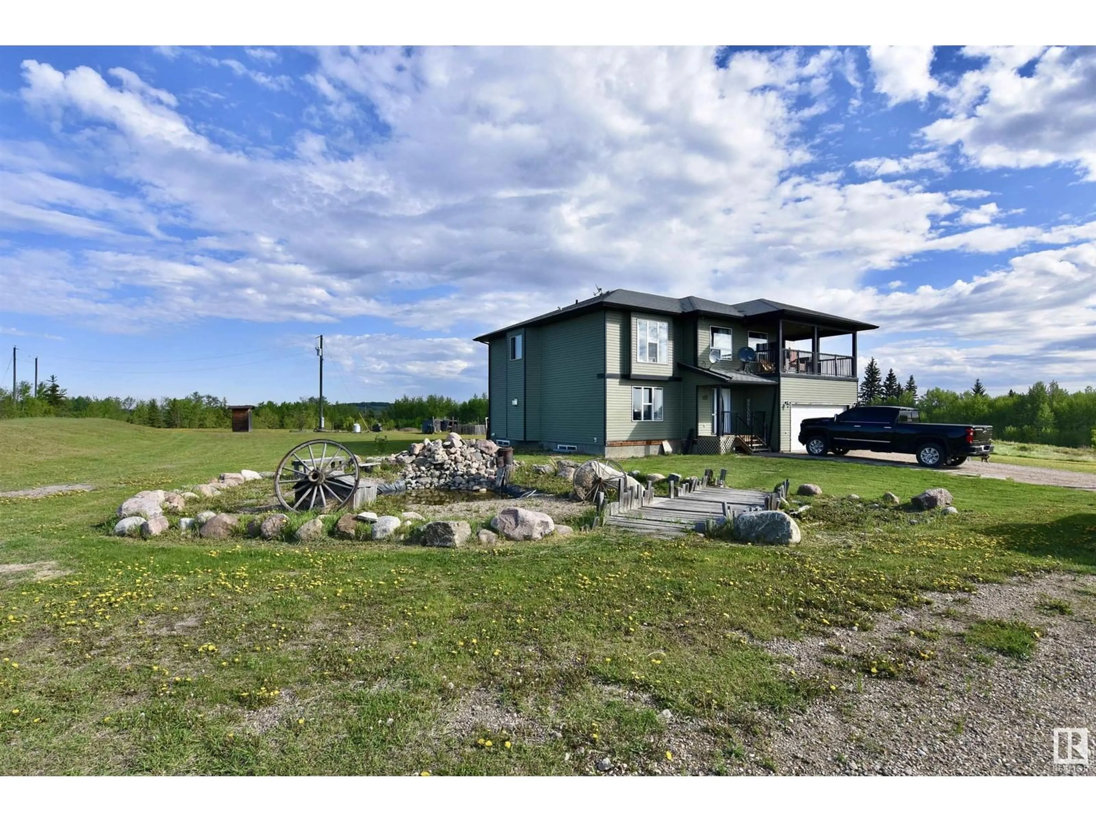 A pic from outside/outdoor area/front of a property/back of a property/a pic from drone, unknown for 56401 RR 105, Rural St. Paul County Alberta T0A2G0