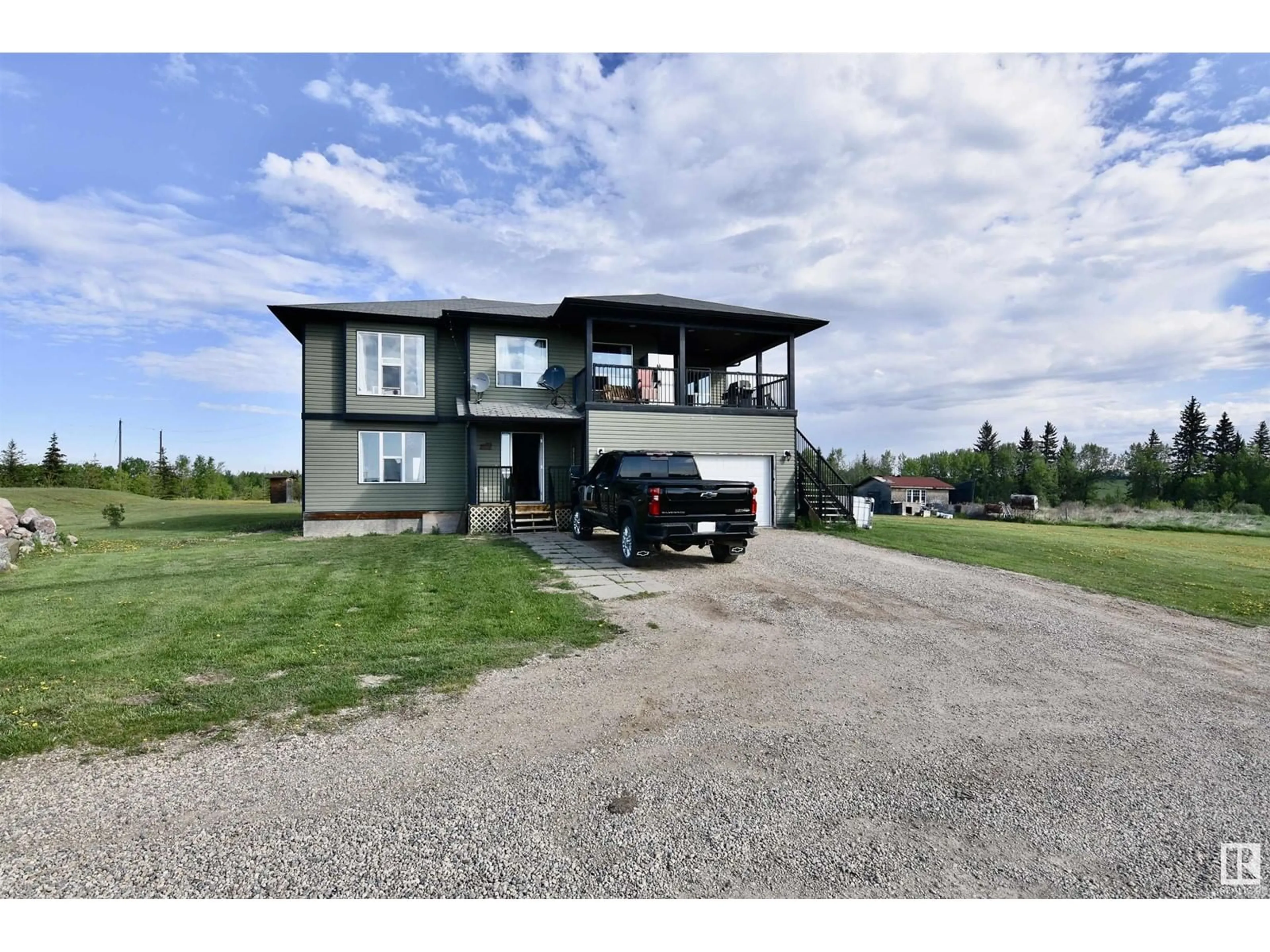 A pic from outside/outdoor area/front of a property/back of a property/a pic from drone, unknown for 56401 RR 105, Rural St. Paul County Alberta T0A2G0