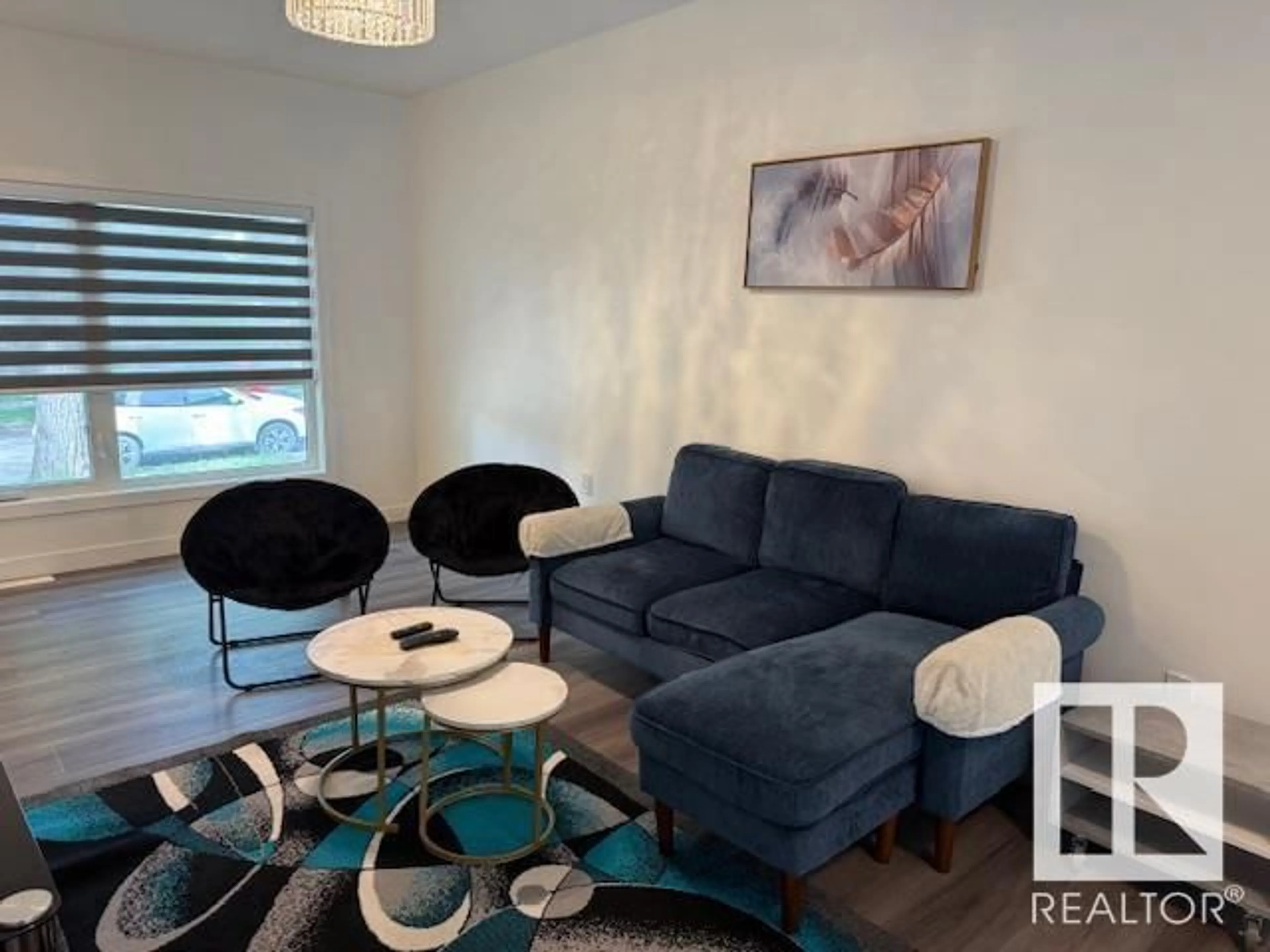 Living room with furniture, unknown for 10947 73 AV, Edmonton Alberta T6G0C3
