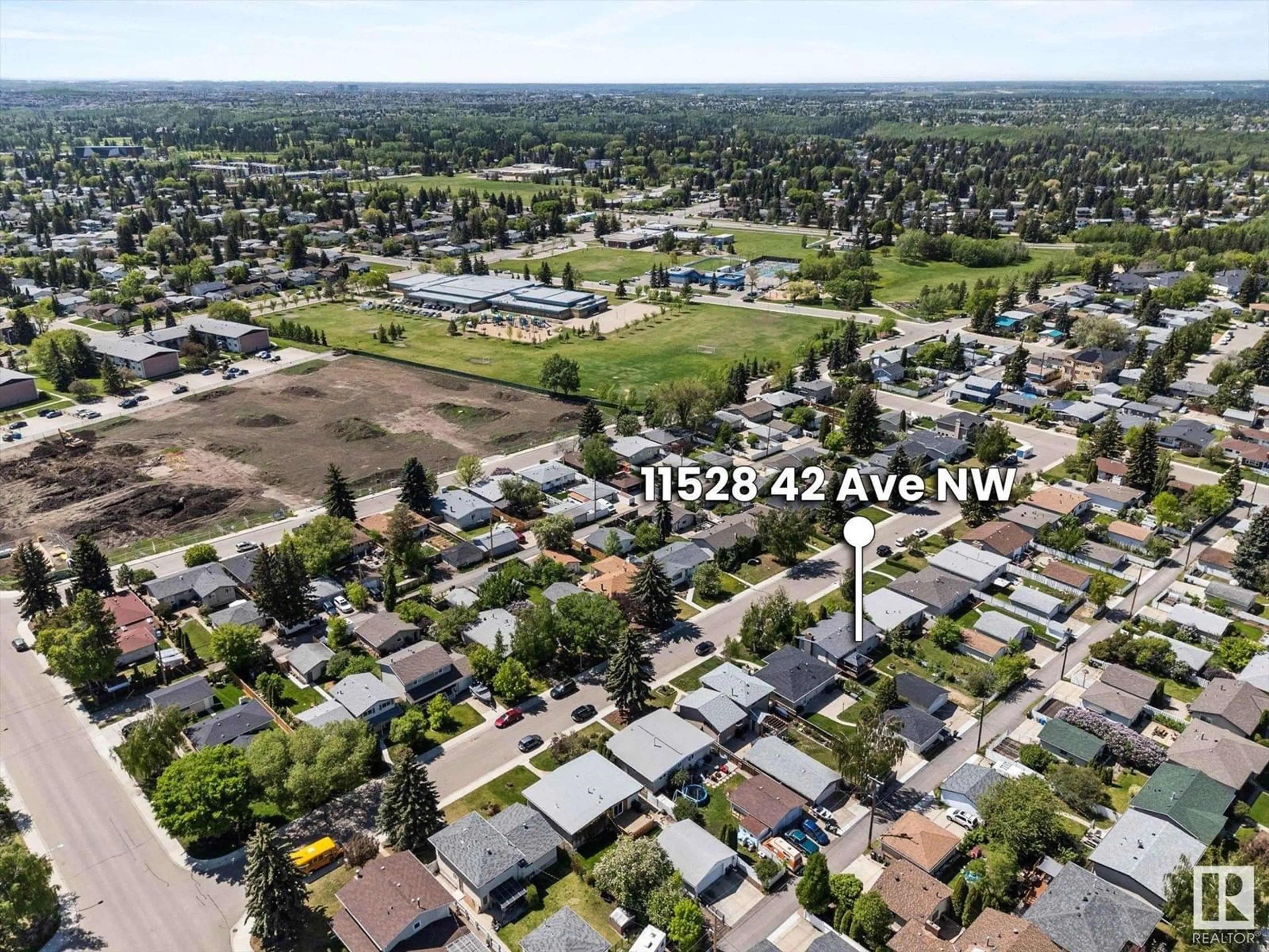 A pic from outside/outdoor area/front of a property/back of a property/a pic from drone, street for 11528 42 AV, Edmonton Alberta T6J0W5
