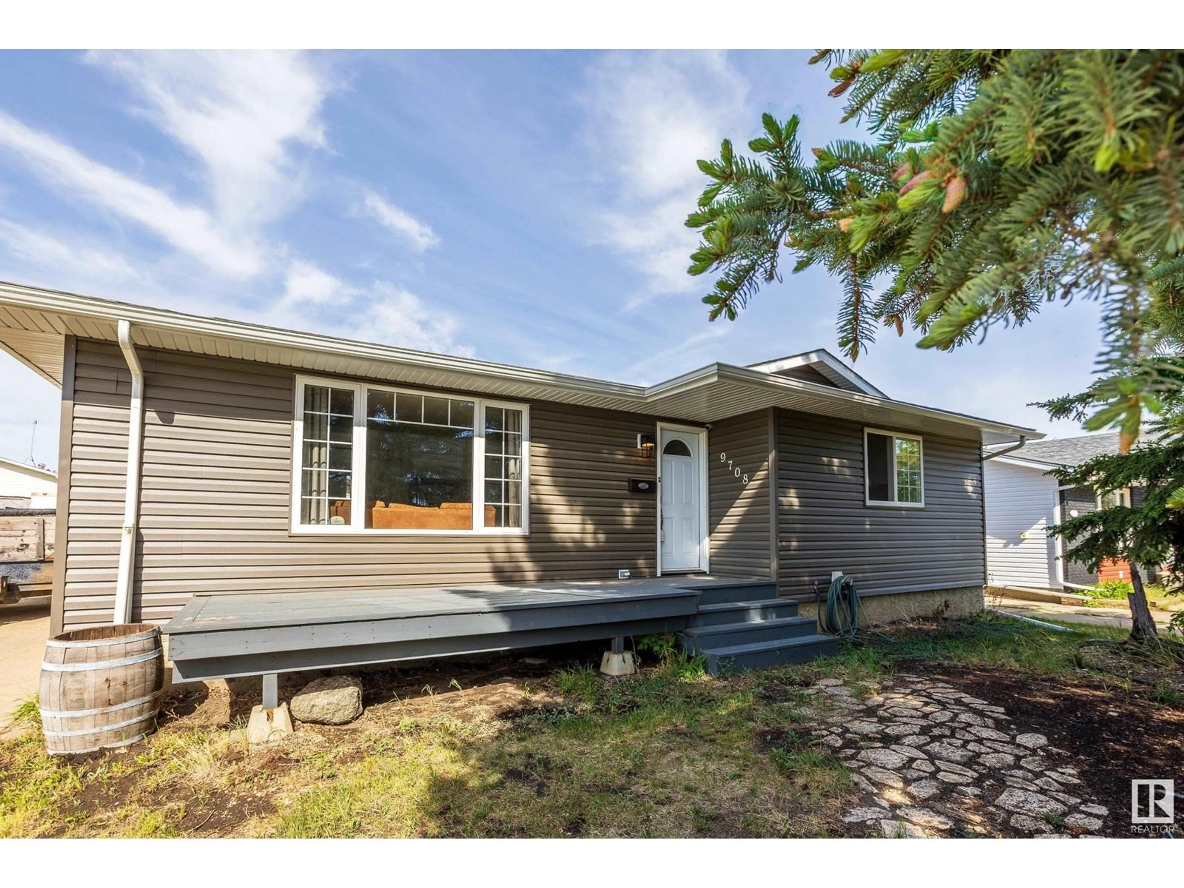 Home with vinyl exterior material, street for 9708 MORINVILLE DR, Morinville Alberta T8R1J2