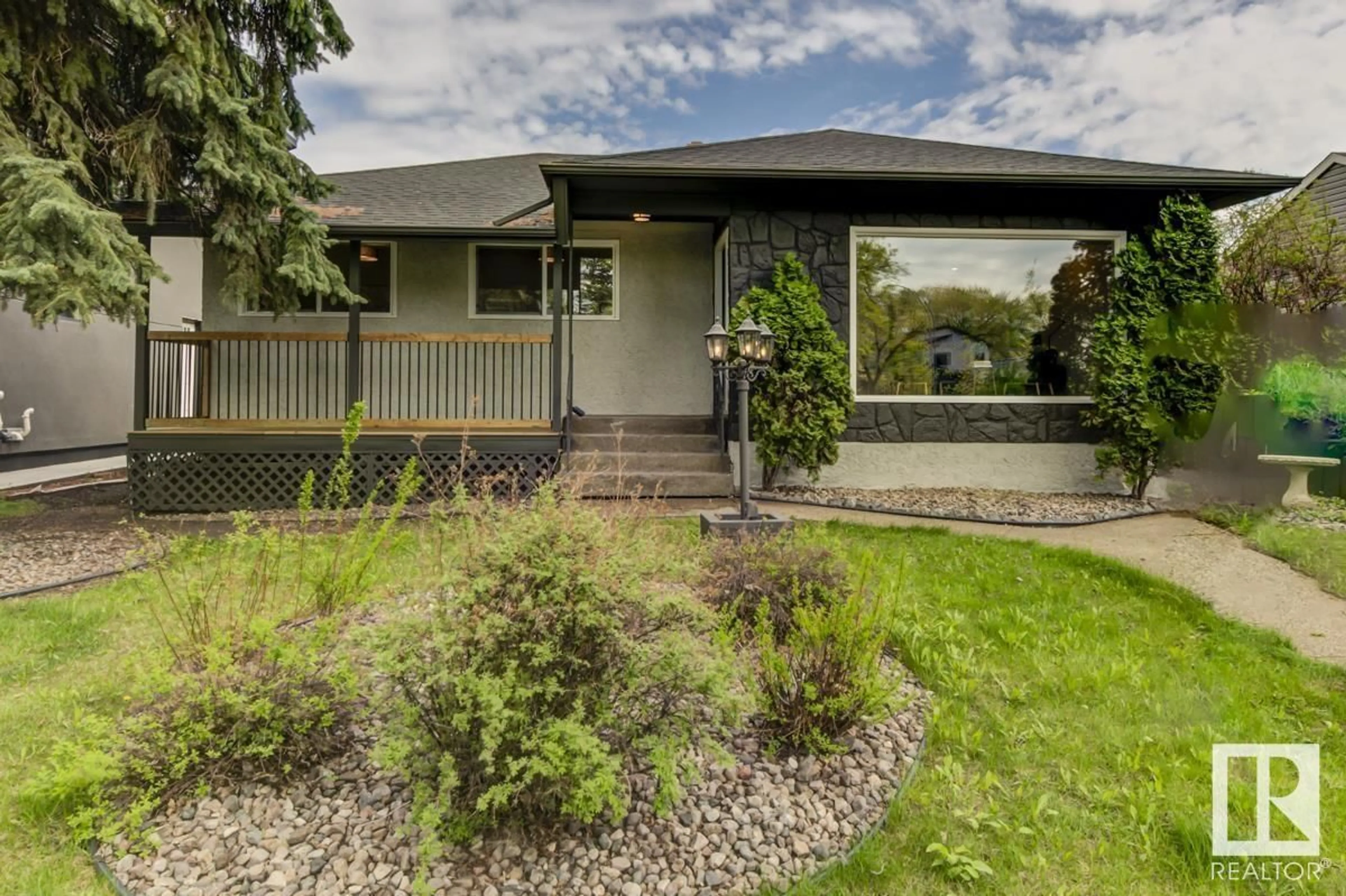 Home with vinyl exterior material, street for 8104 85 AV, Edmonton Alberta T6C4H3