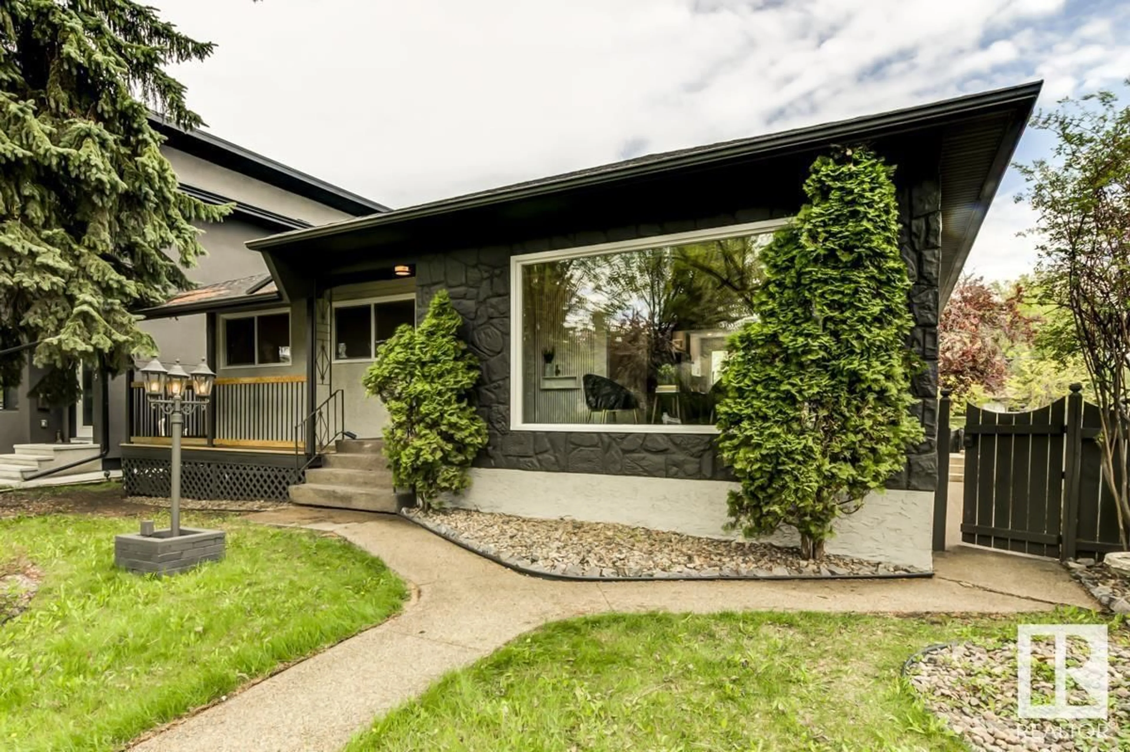 Home with brick exterior material, street for 8104 85 AV, Edmonton Alberta T6C4H3