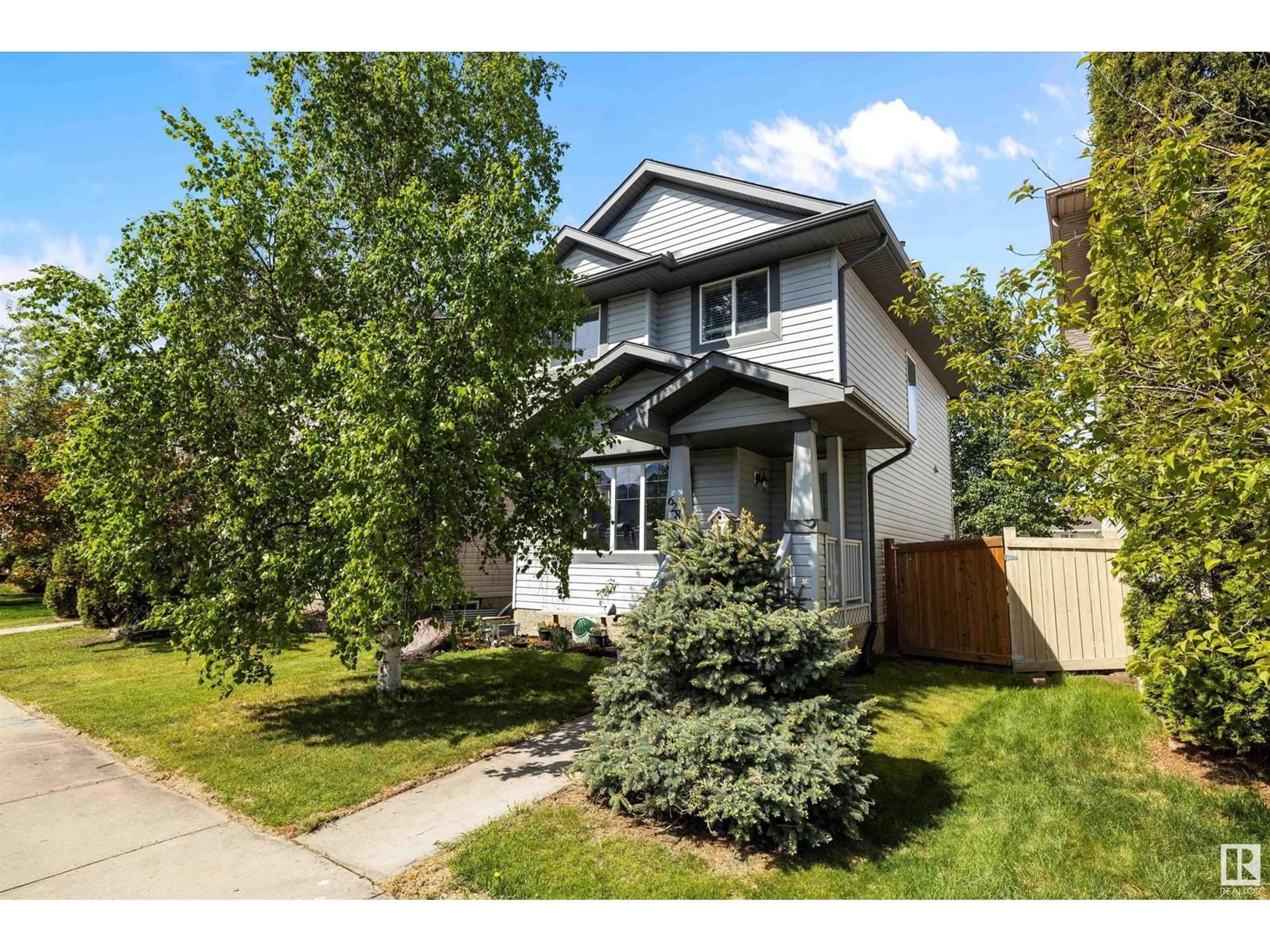 Home with vinyl exterior material, street for 628 88 ST, Edmonton Alberta T6X1E1
