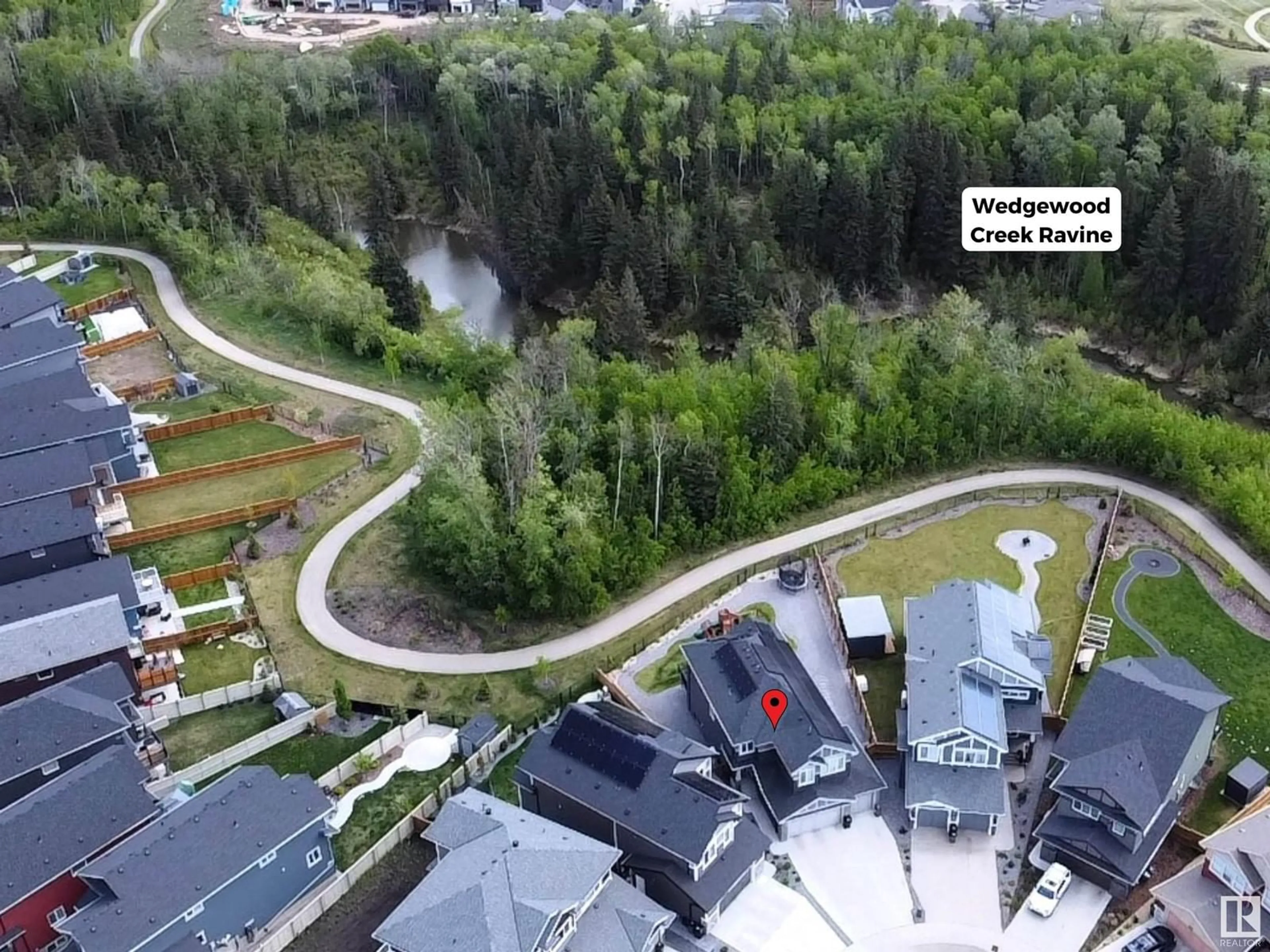 A pic from outside/outdoor area/front of a property/back of a property/a pic from drone, forest/trees view for 1663 ENRIGHT WY, Edmonton Alberta T6M0Z2