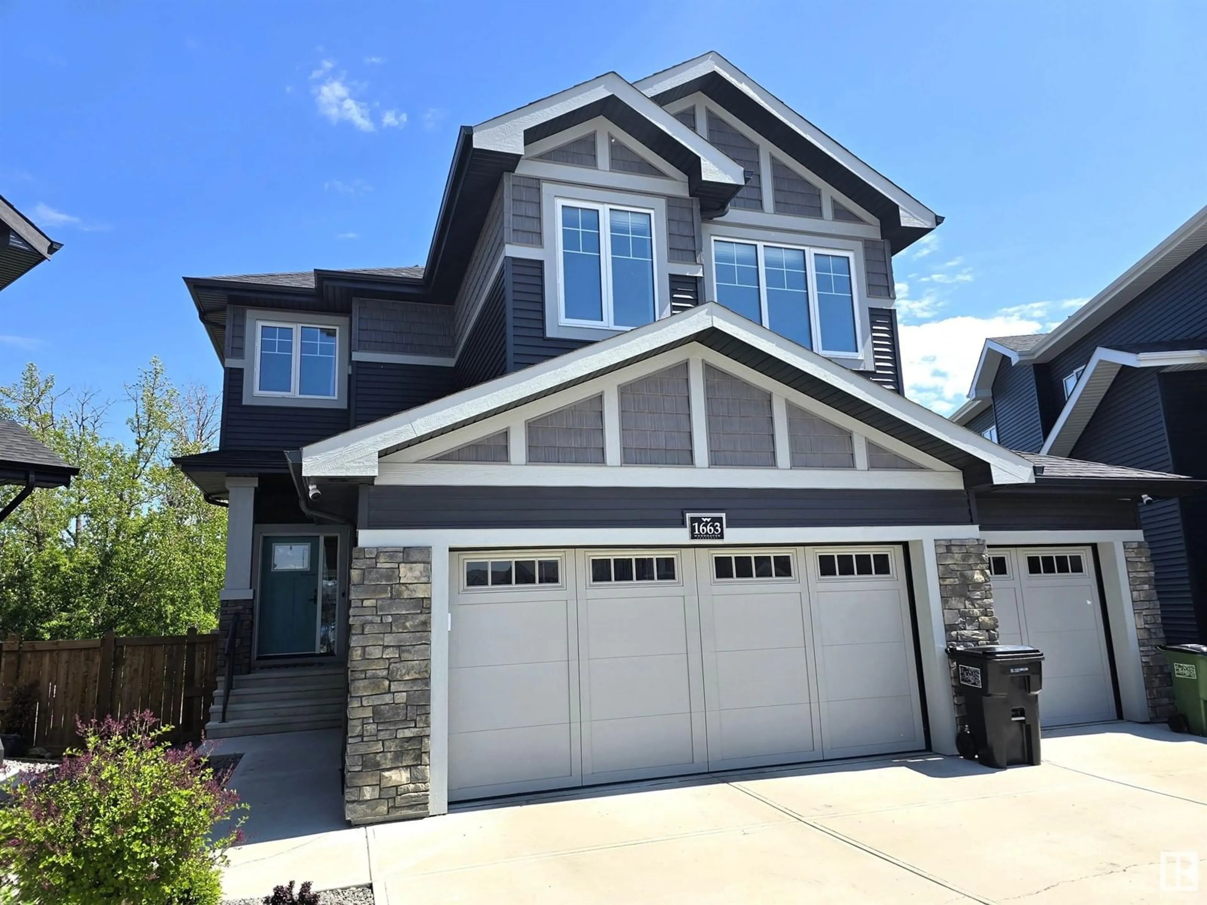 Home with vinyl exterior material, street for 1663 ENRIGHT WY, Edmonton Alberta T6M0Z2