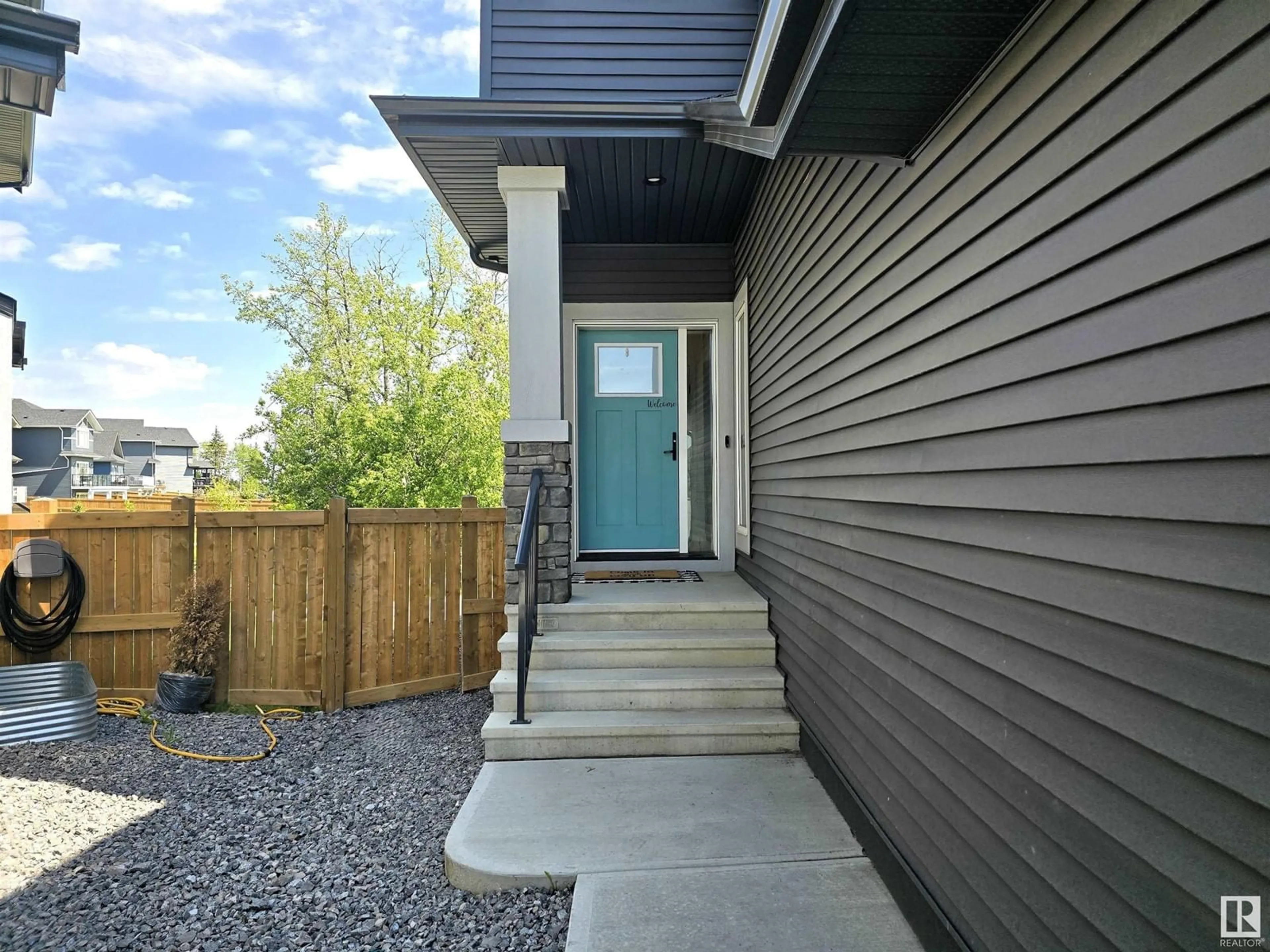 Home with vinyl exterior material, street for 1663 ENRIGHT WY, Edmonton Alberta T6M0Z2