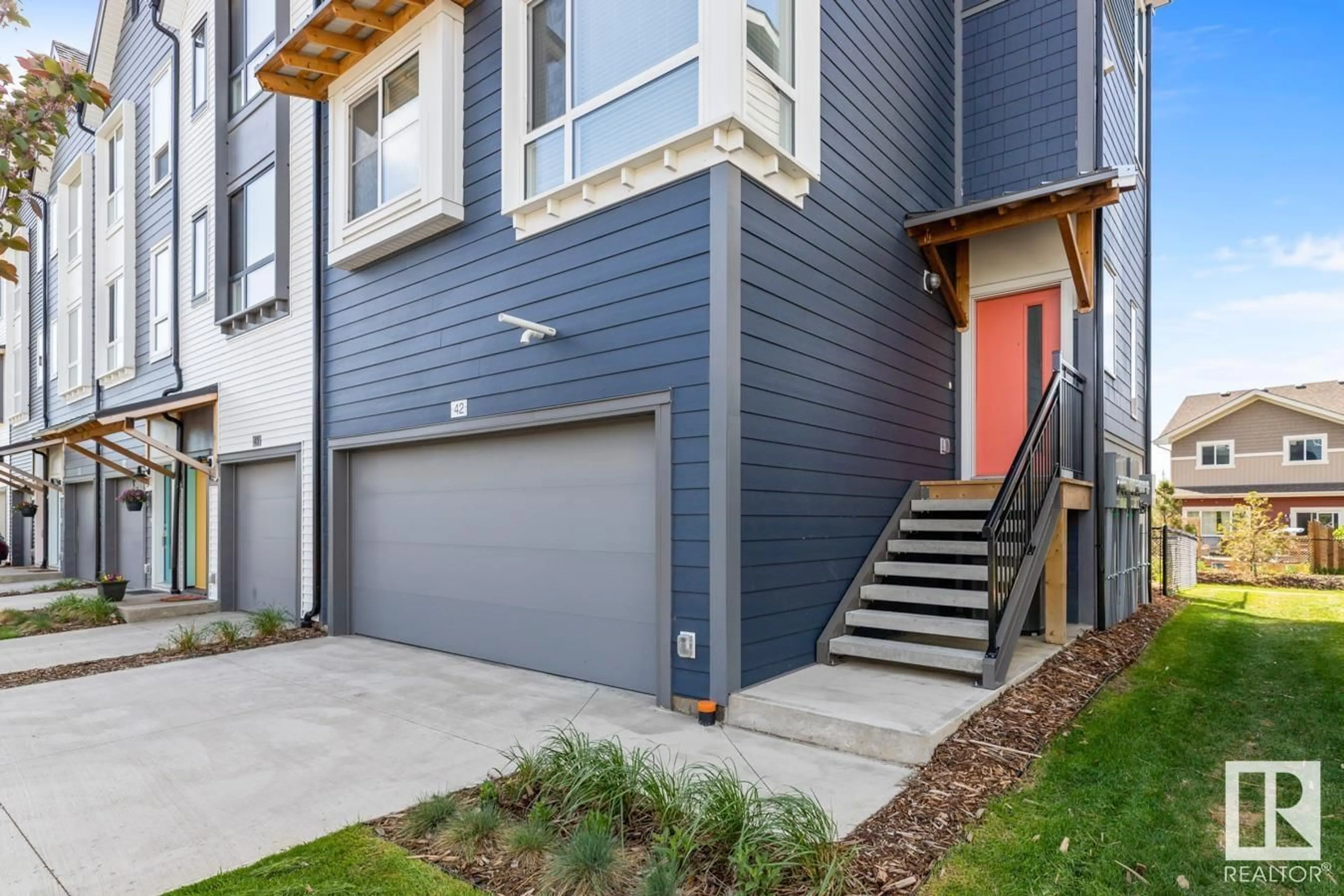 Home with vinyl exterior material, street for 42 - 100 JENSEN LAKES BV, St. Albert Alberta T8N7T9