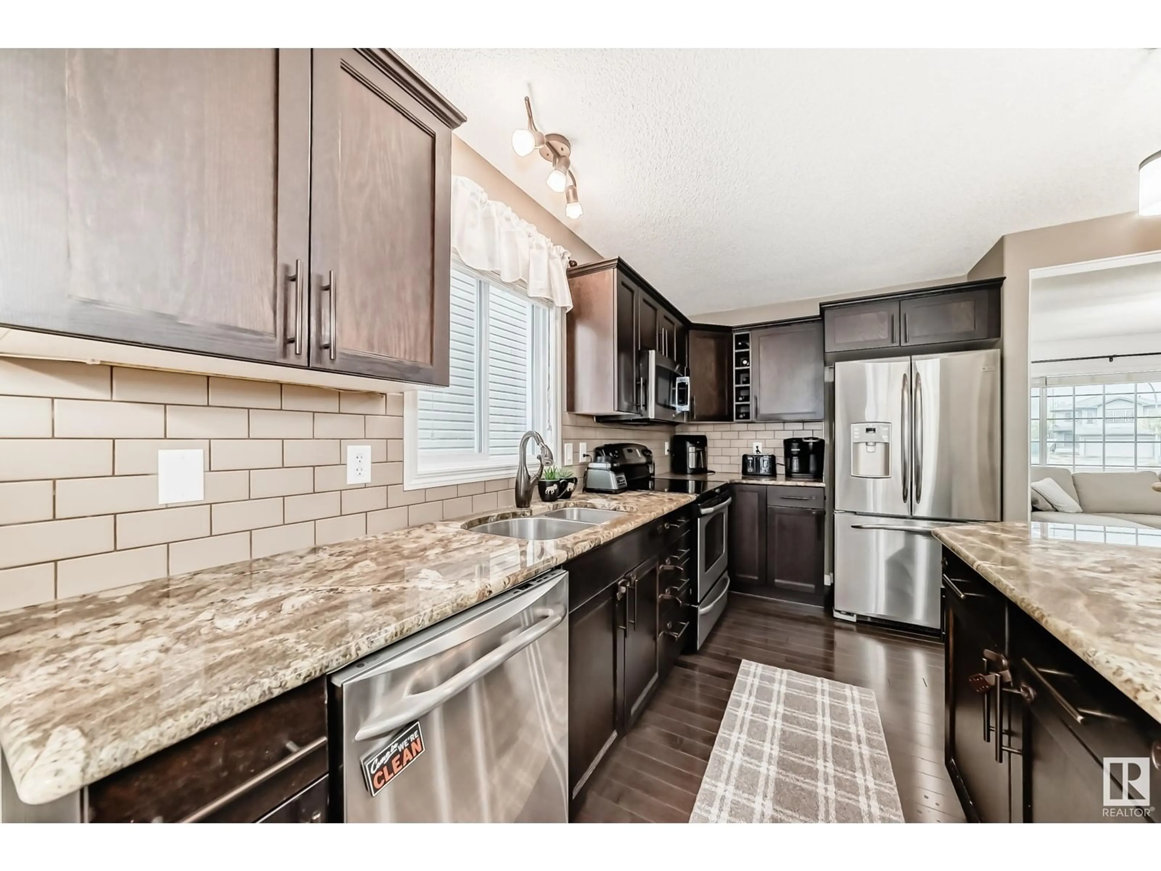 Open concept kitchen, ceramic/tile floor for NW - 8736 180 AV, Edmonton Alberta T5Z0E3