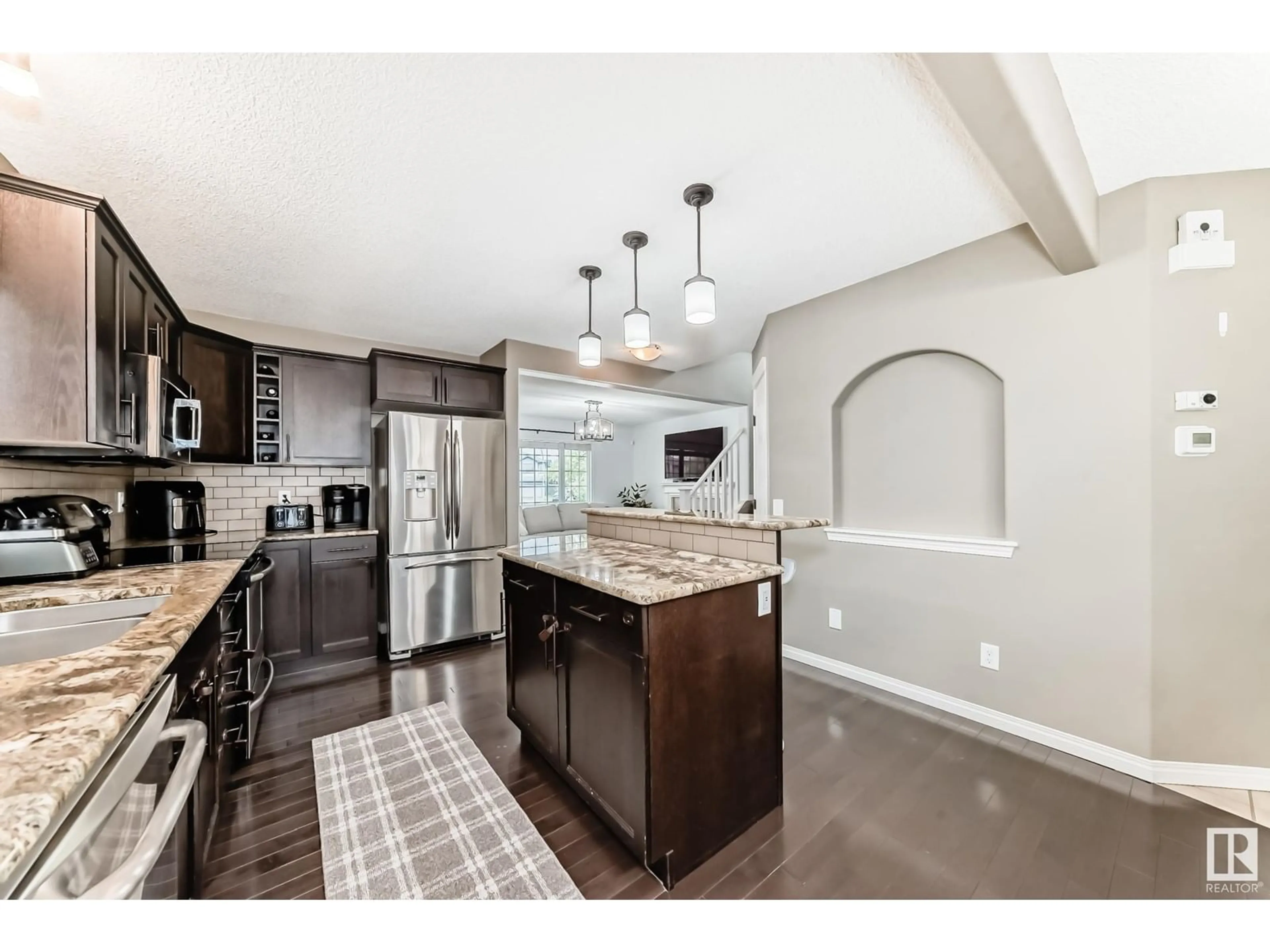 Open concept kitchen, ceramic/tile floor for NW - 8736 180 AV, Edmonton Alberta T5Z0E3