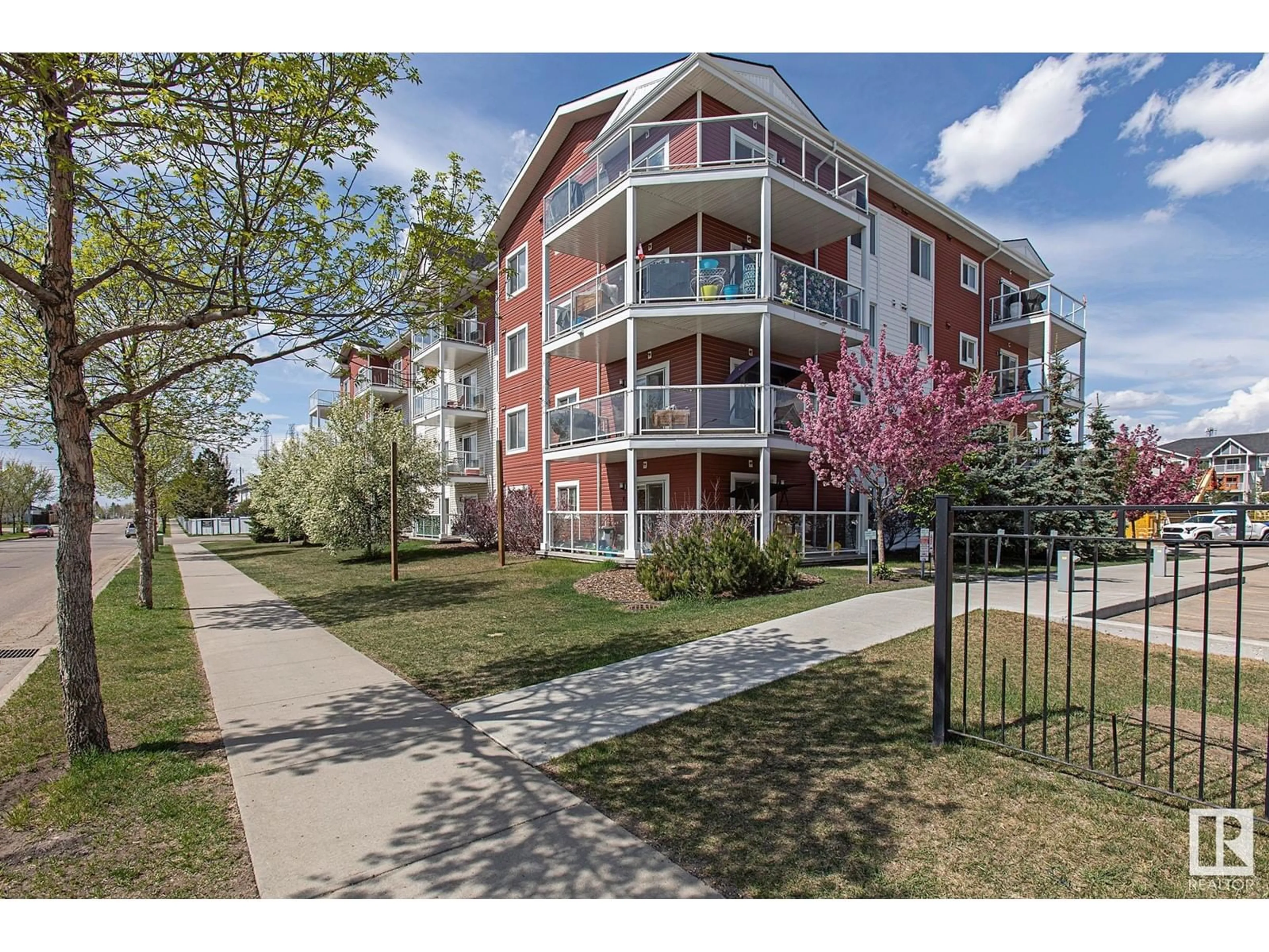 A pic from outside/outdoor area/front of a property/back of a property/a pic from drone, street for 405 - 2229 44 AV NW, Edmonton Alberta T6T0W6