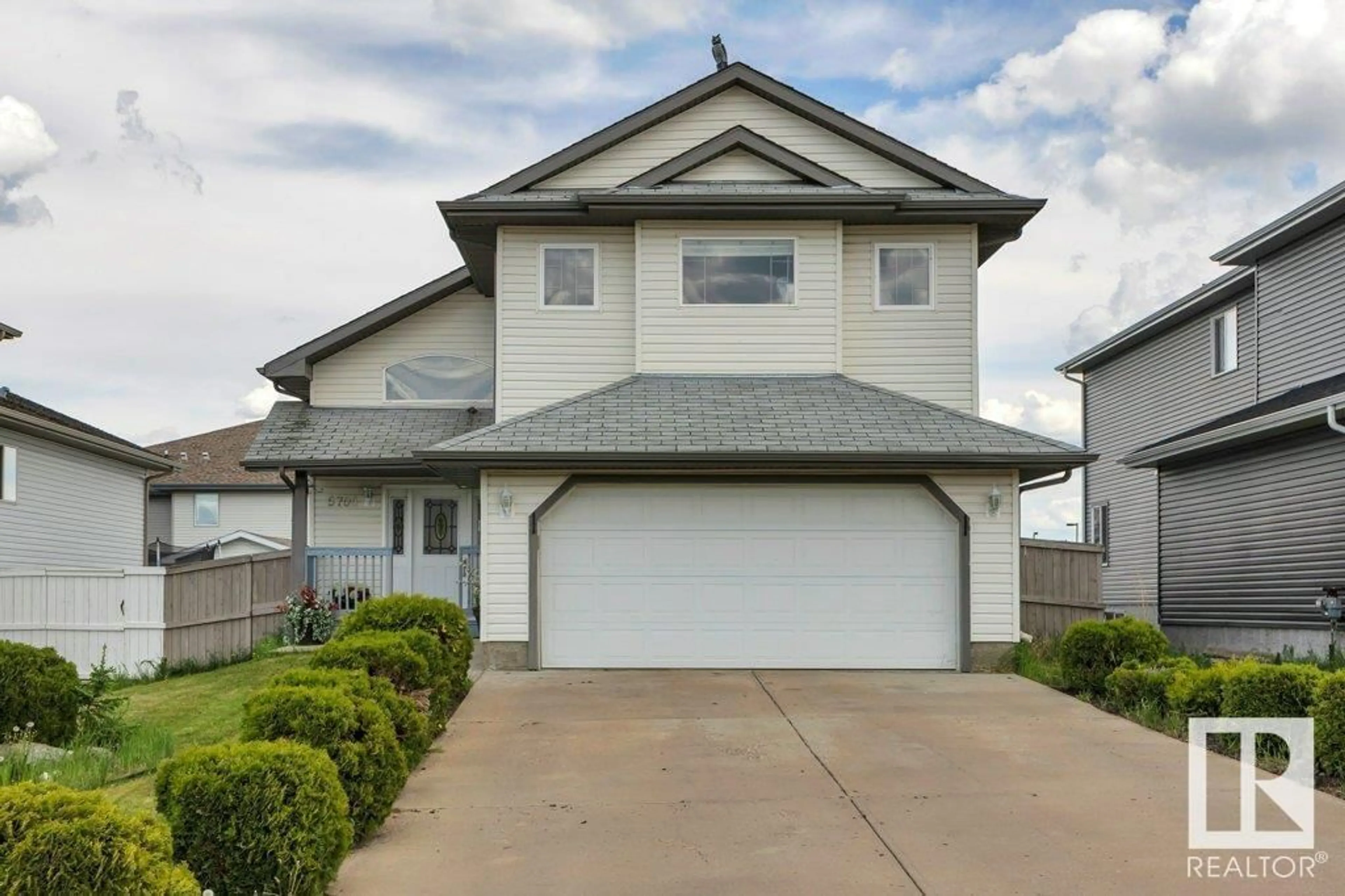 Home with vinyl exterior material, street for 5705 45 ST, Tofield Alberta T0B4J0