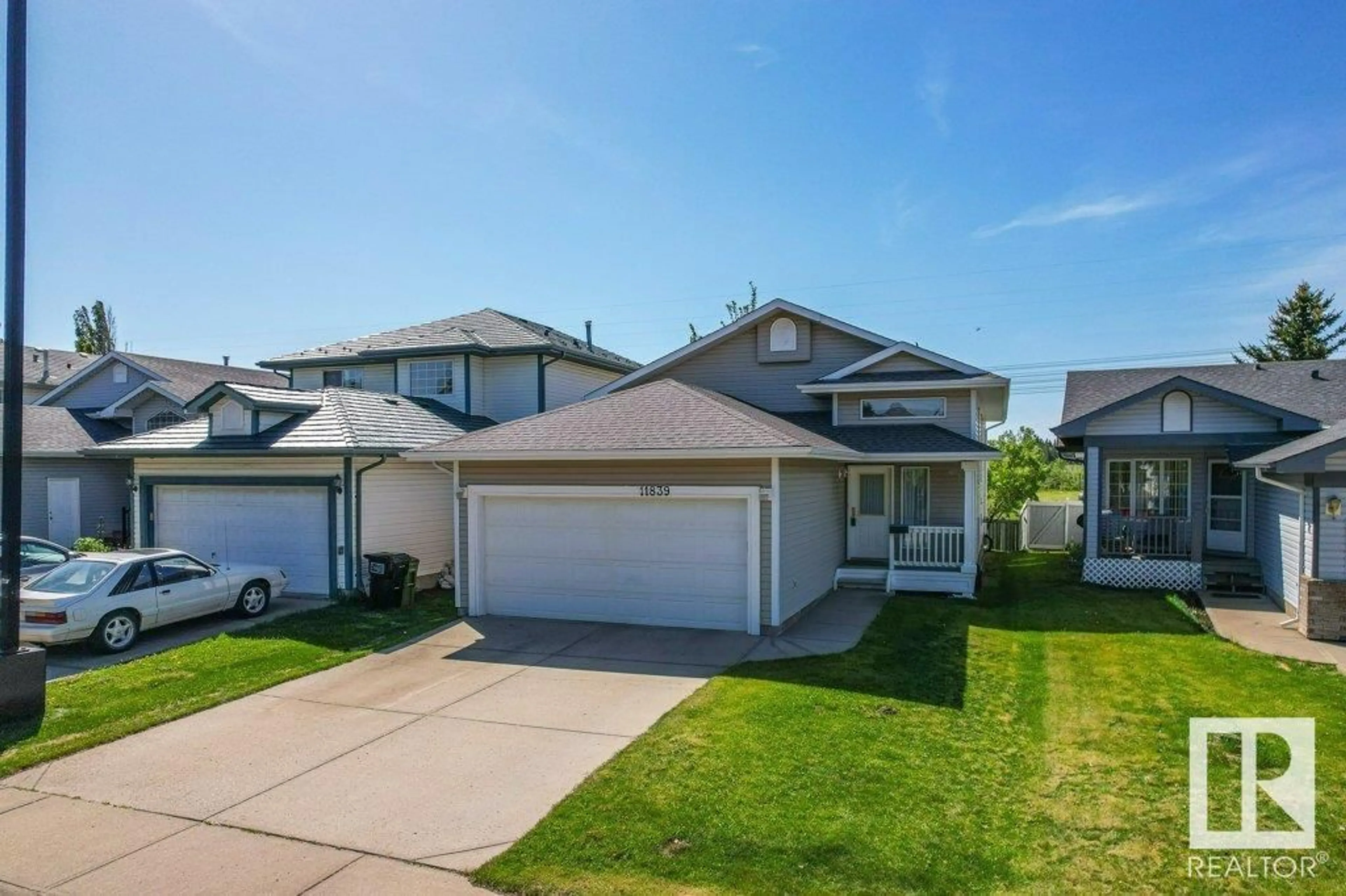 A pic from outside/outdoor area/front of a property/back of a property/a pic from drone, street for 11839 8 AV, Edmonton Alberta T6J6Z9
