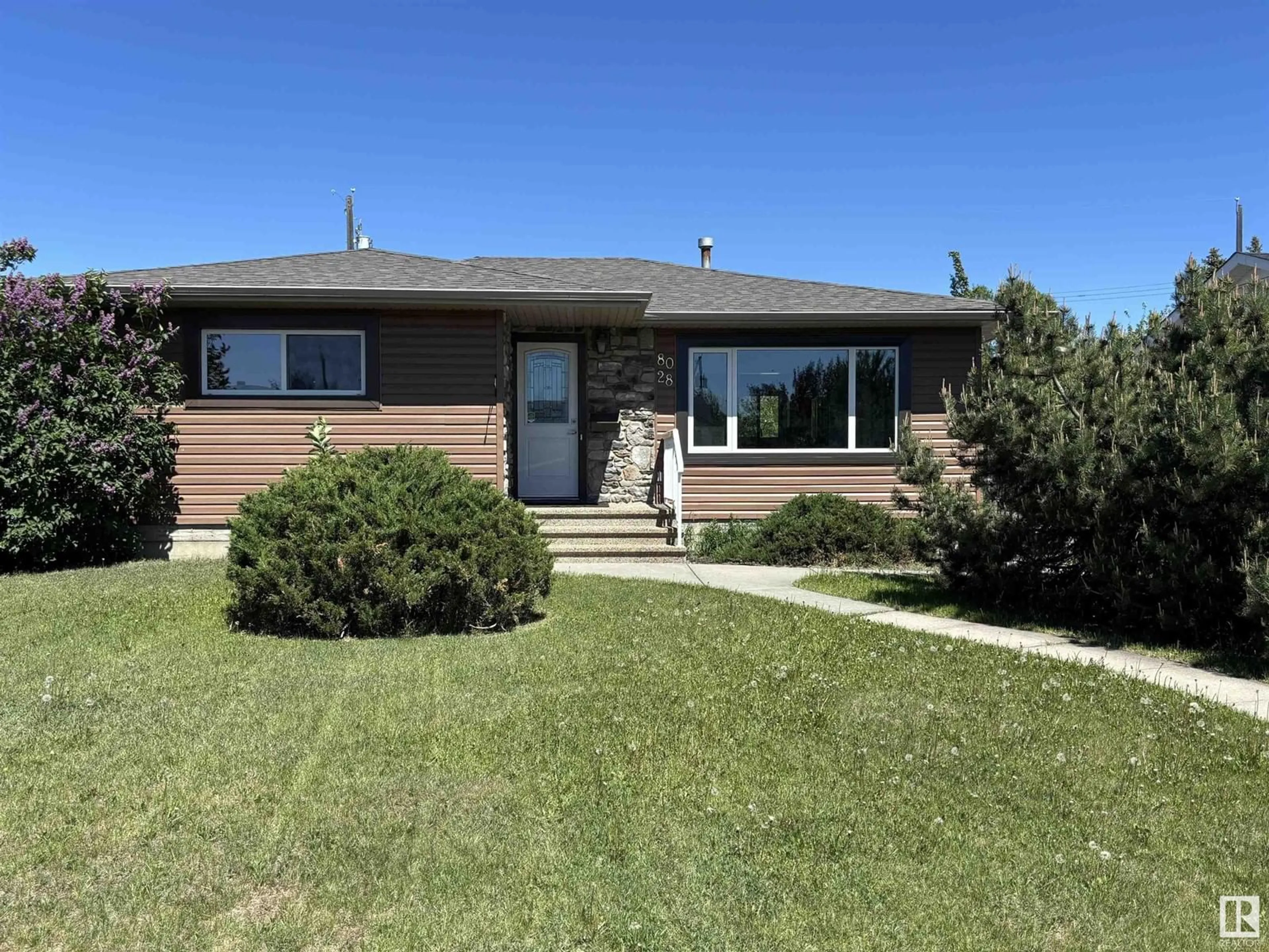 Home with vinyl exterior material, street for NW - 8028 134A AV, Edmonton Alberta T5C2G9