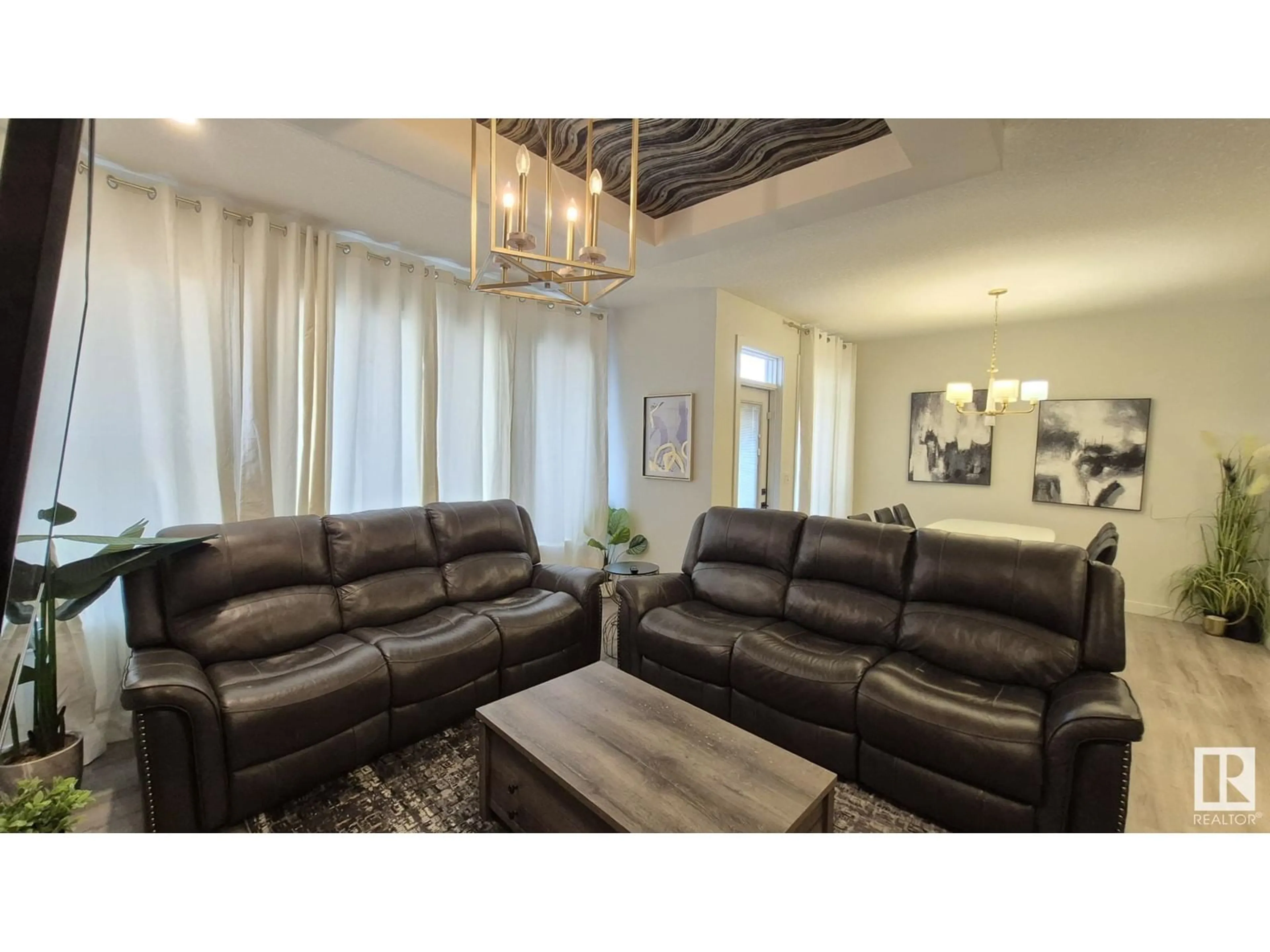 Living room with furniture, unknown for SW - 5213 22A AV, Edmonton Alberta T6X2Y1