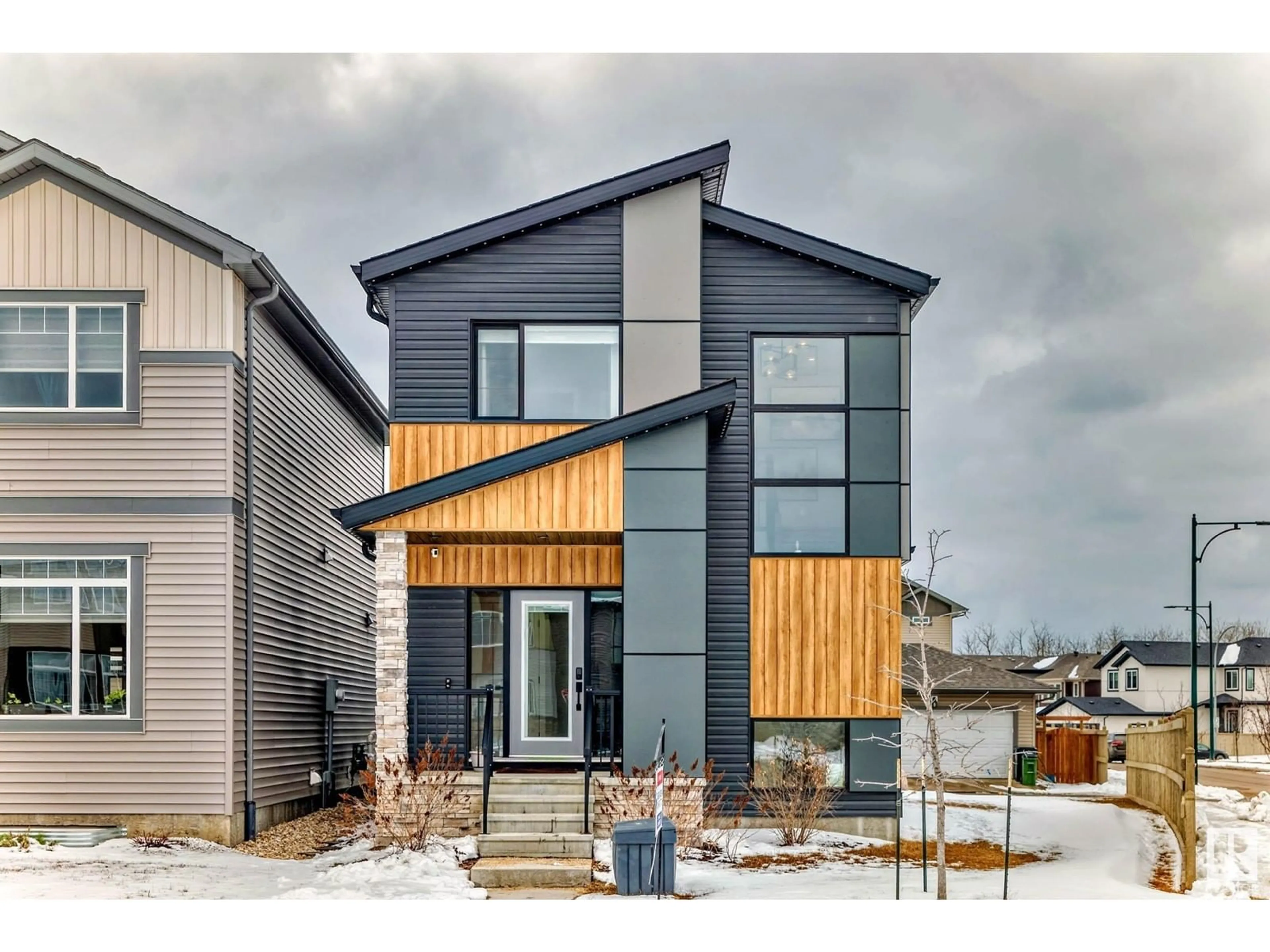 Home with vinyl exterior material, street for 451 37 AV, Edmonton Alberta T6T2L7