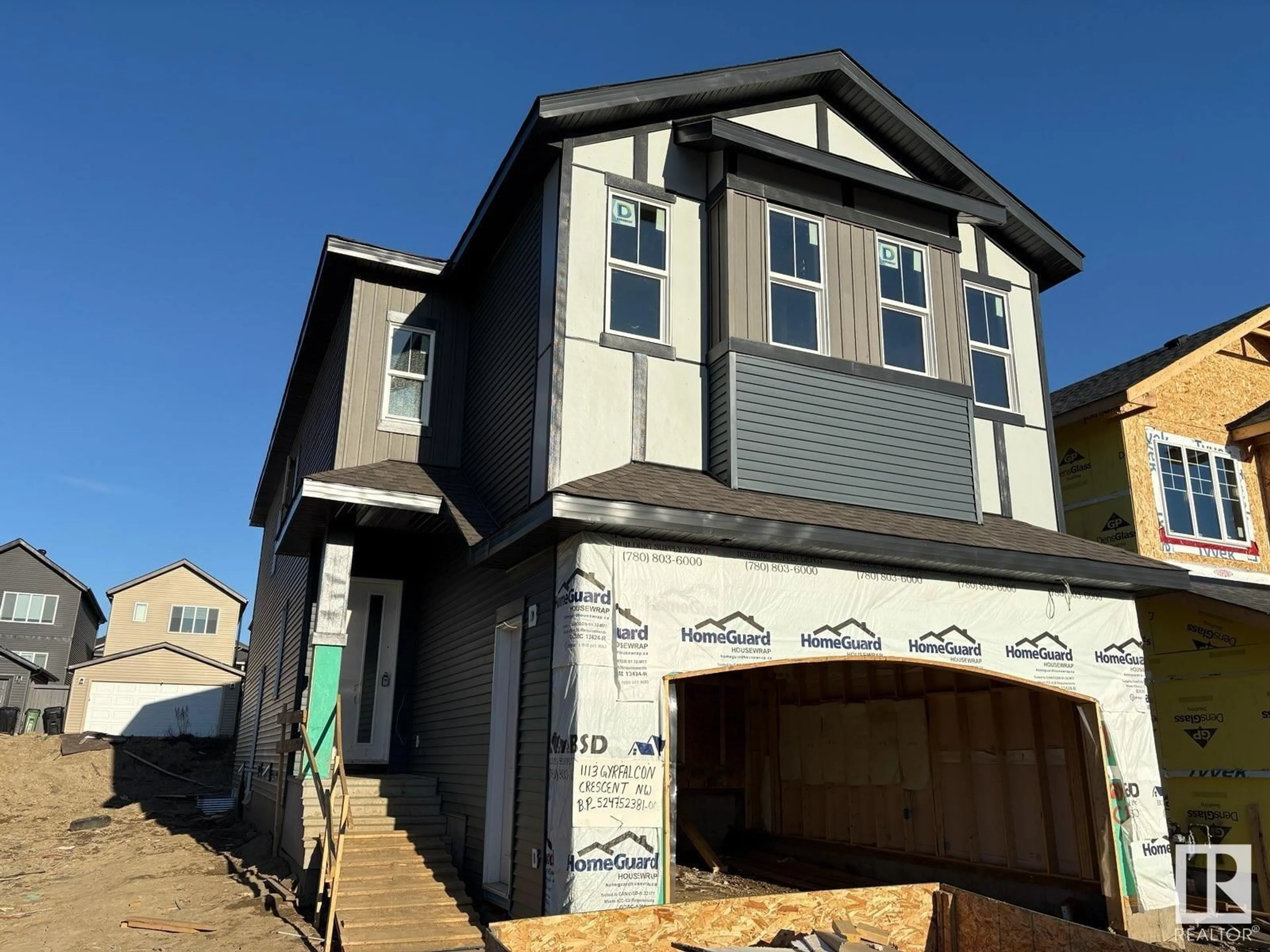 Home with vinyl exterior material, street for 1113 GYRFALCON CR, Edmonton Alberta T5S0S5