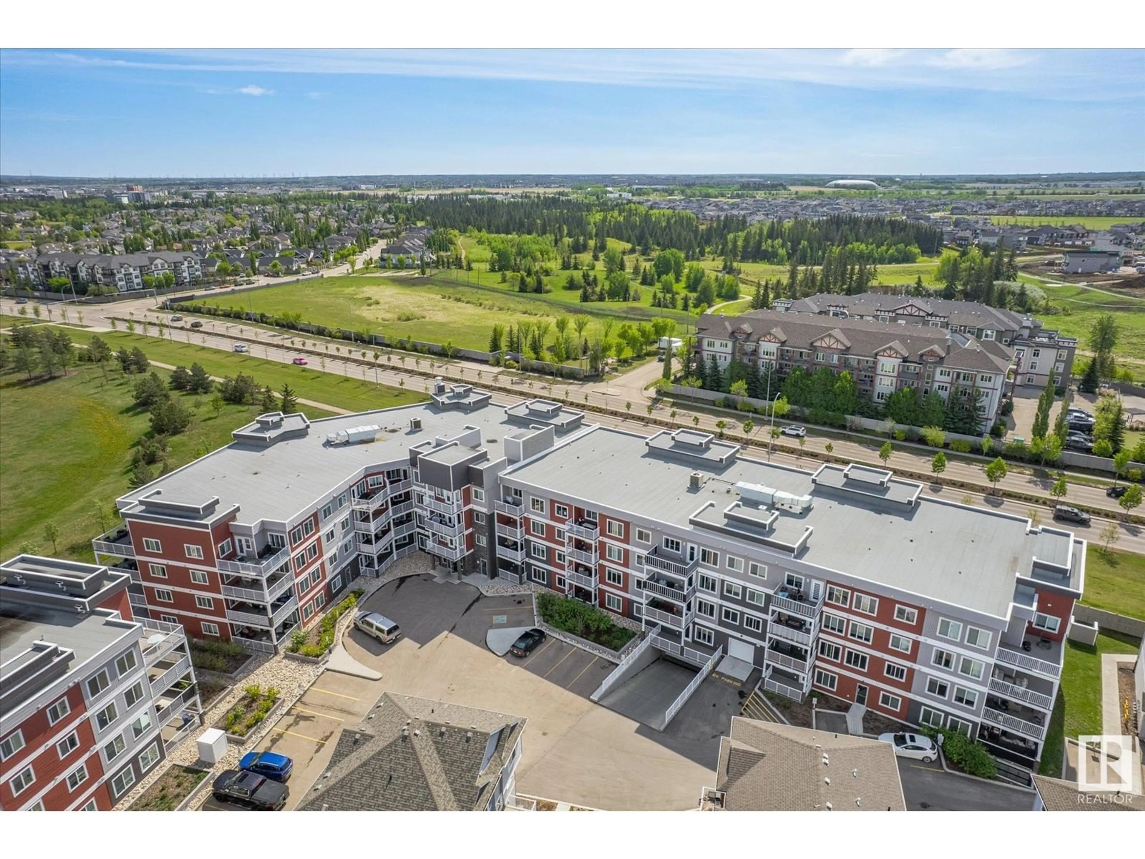 A pic from outside/outdoor area/front of a property/back of a property/a pic from drone, city buildings view from balcony for #243 - 1818 RUTHERFORD RD, Edmonton Alberta T6W2K6