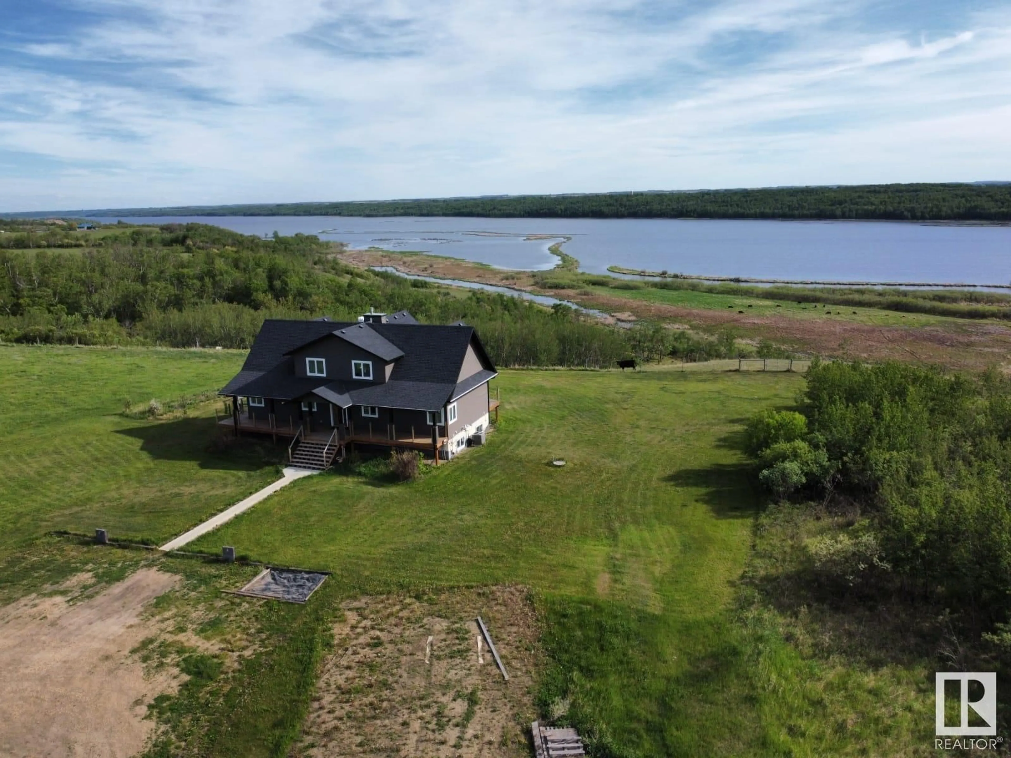 A pic from outside/outdoor area/front of a property/back of a property/a pic from drone, water/lake/river/ocean view for 20213 TOWNSHIP ROAD 460, Rural Camrose County Alberta T4V2M9