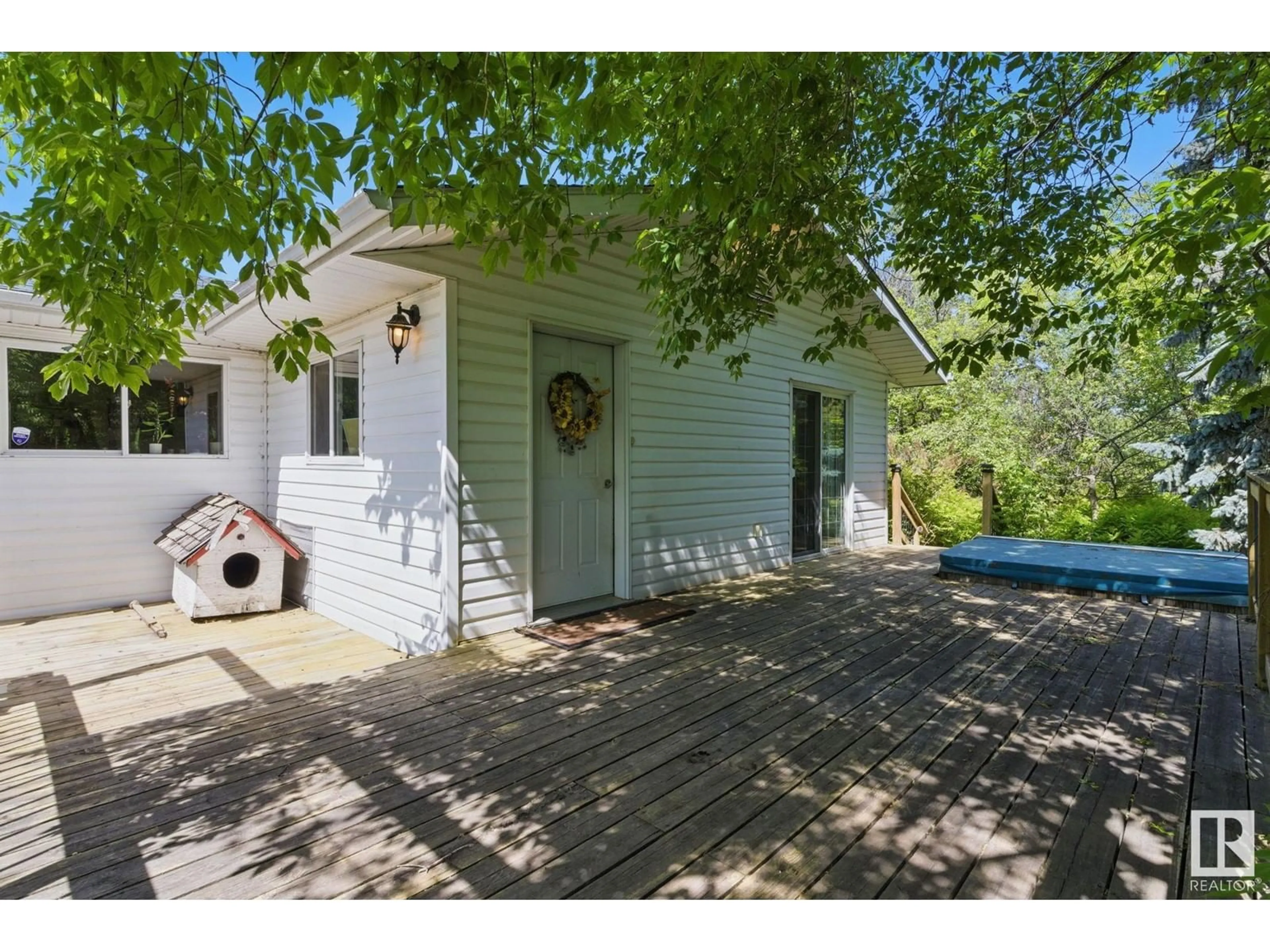 A pic from outside/outdoor area/front of a property/back of a property/a pic from drone, street for 60027 RR 40, Rural Barrhead County Alberta T7N1N3