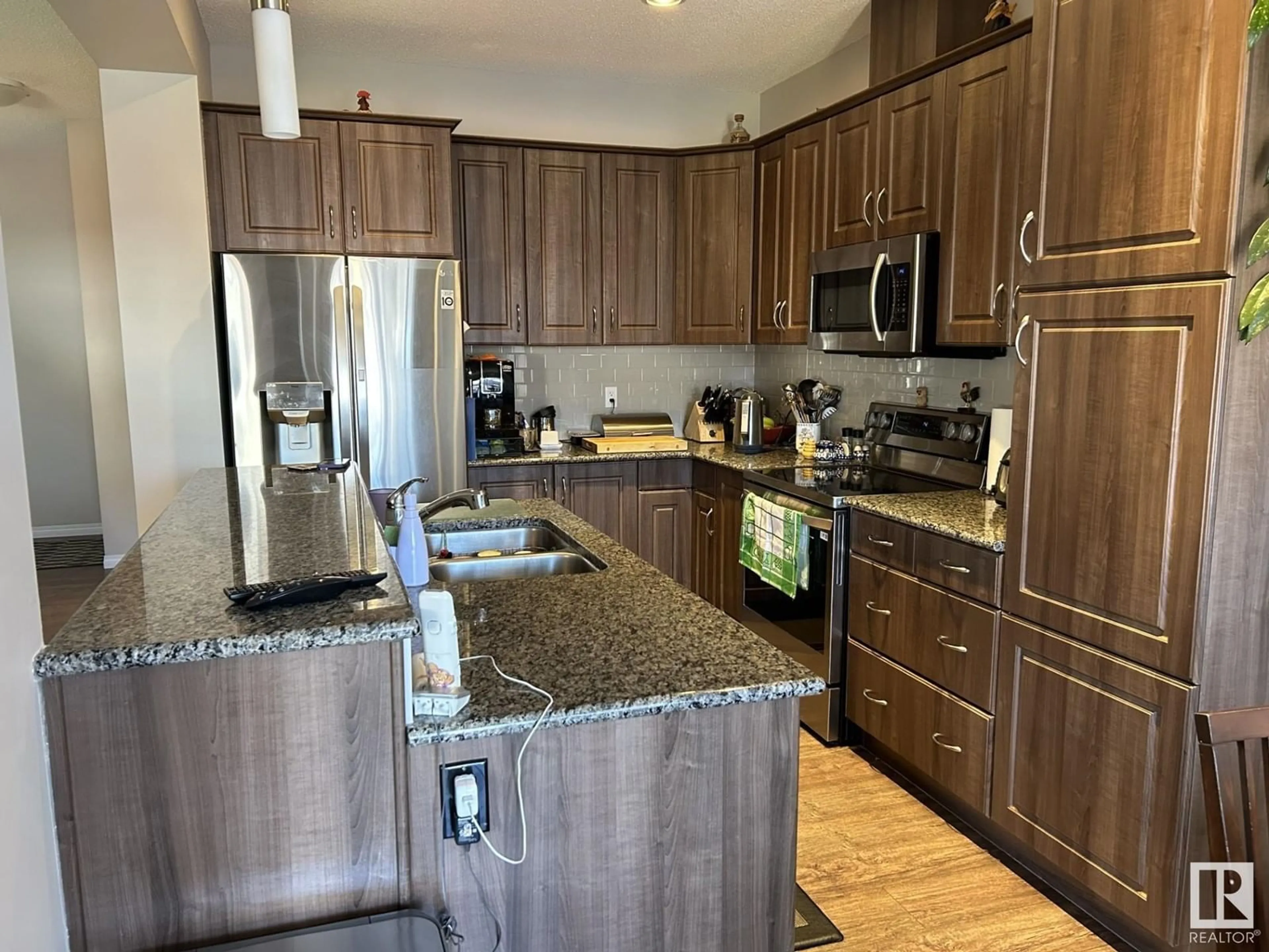 Open concept kitchen, wood/laminate floor for 5870 ANTHONY CR, Edmonton Alberta T6W3H4