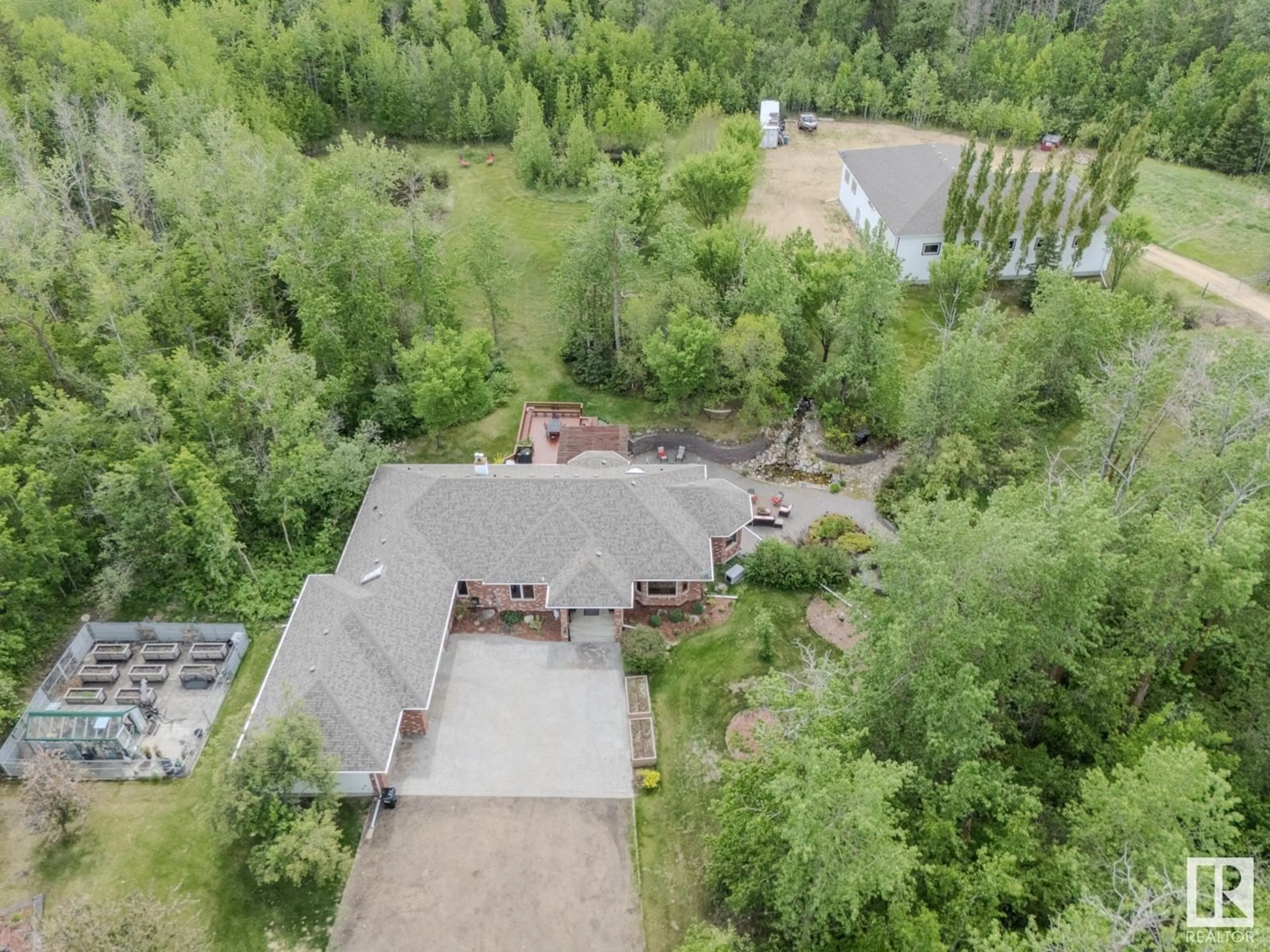 A pic from outside/outdoor area/front of a property/back of a property/a pic from drone, forest/trees view for 21545 TWP ROAD 522, Rural Strathcona County Alberta T8E1G1