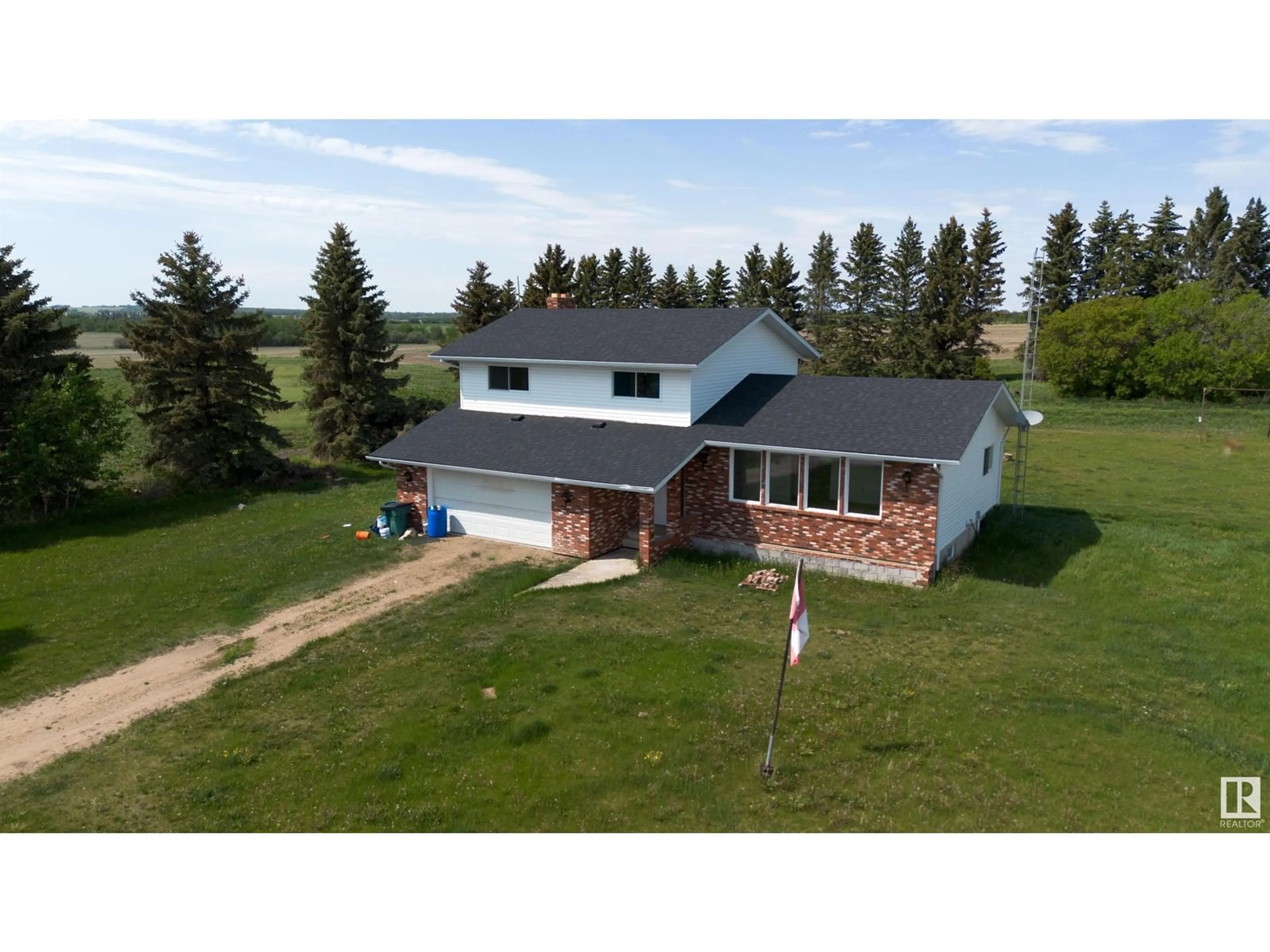 A pic from outside/outdoor area/front of a property/back of a property/a pic from drone, building for 59107 RR 10, Rural Westlock County Alberta T0G1W0