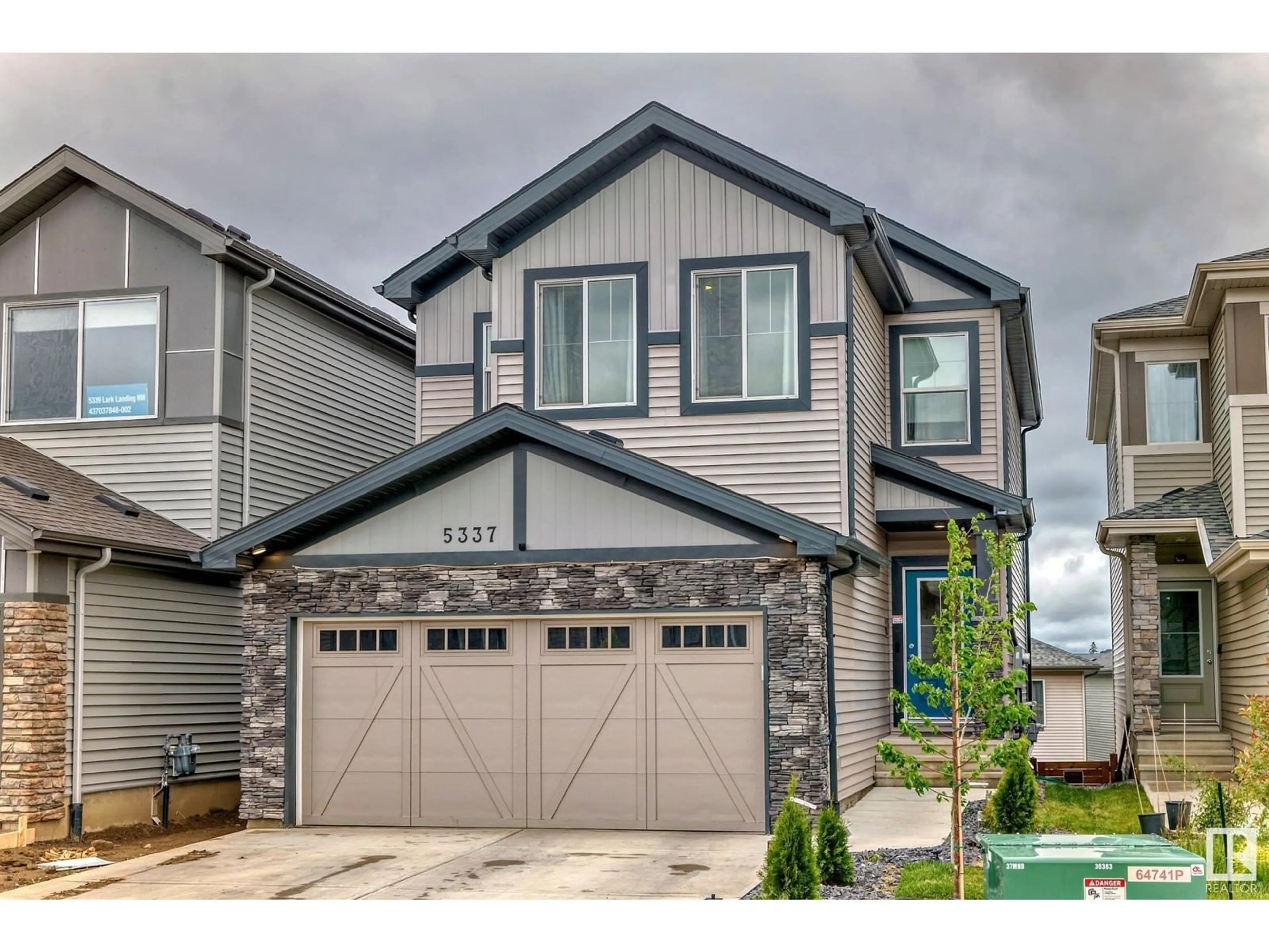 Home with vinyl exterior material, street for 5337 LARK LANDING NW, Edmonton Alberta T5S0P2
