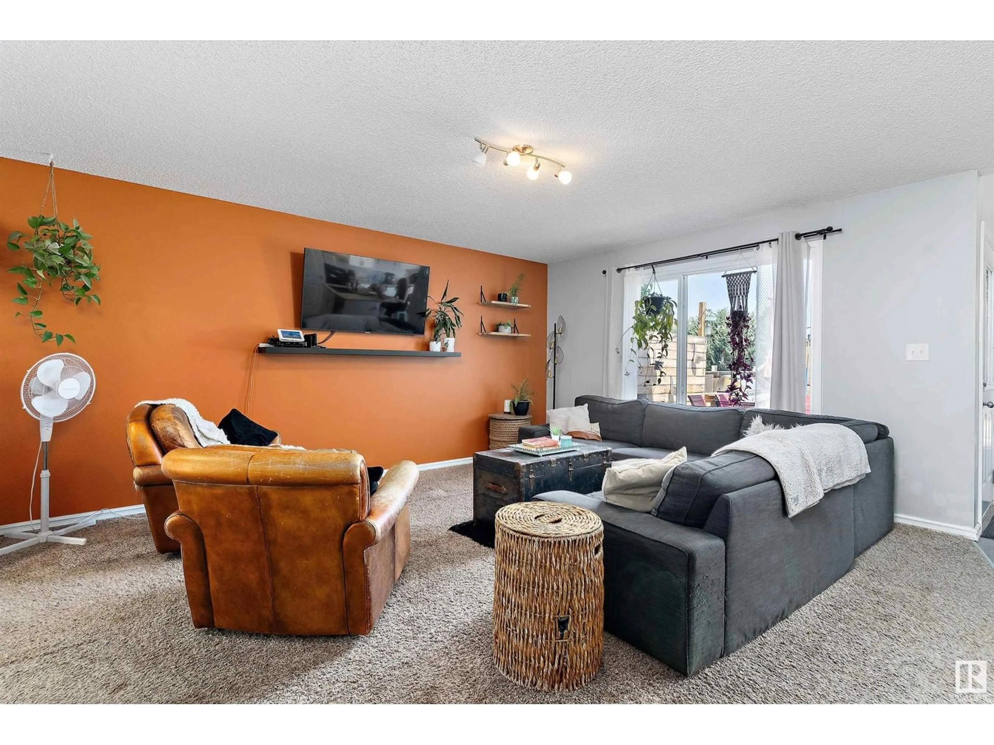 Living room with furniture, unknown for 131 RUE MASSON, Beaumont Alberta T4X1S8