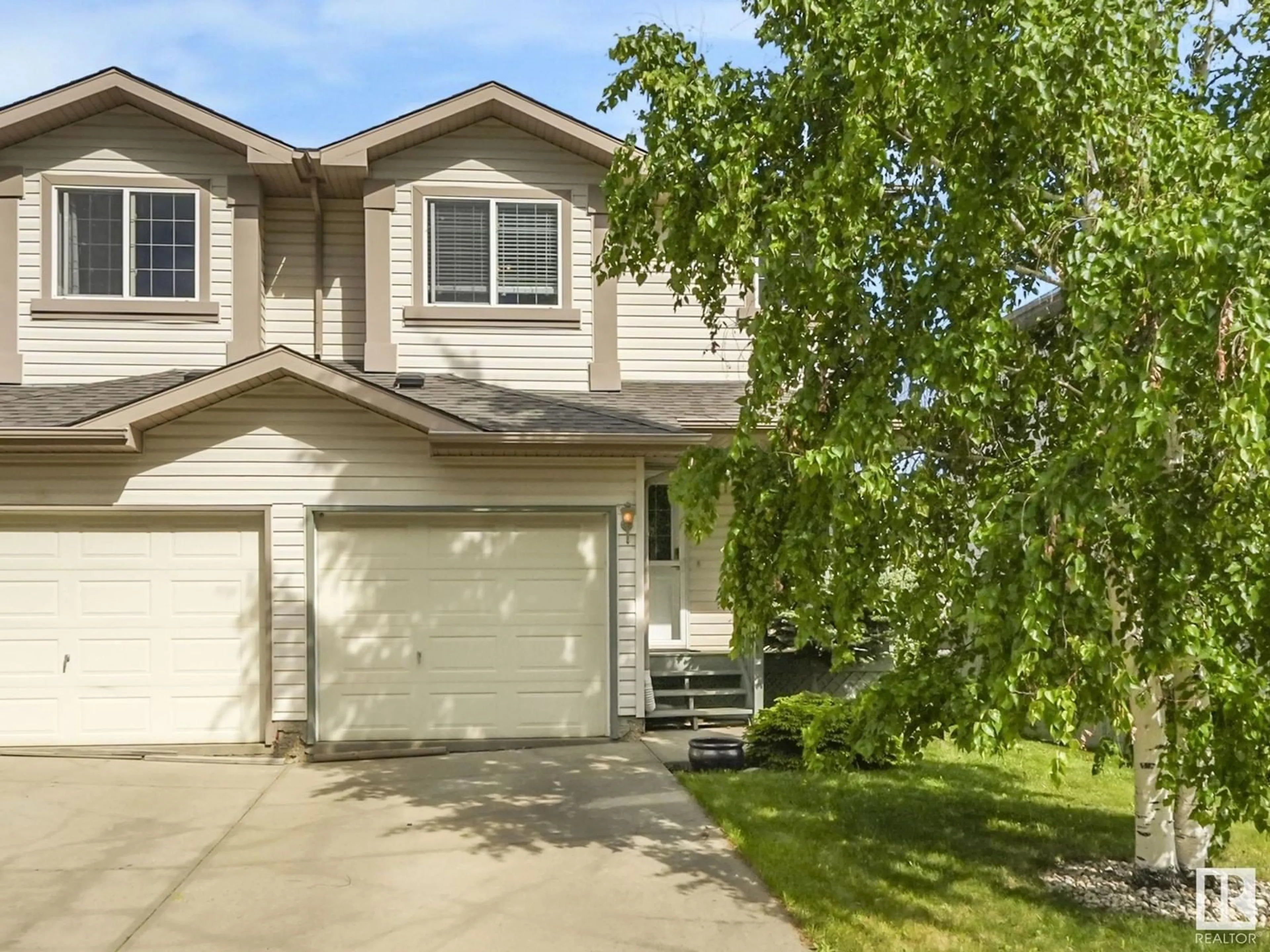 Home with vinyl exterior material, street for NW - 3747 21 ST, Edmonton Alberta T6T1R7