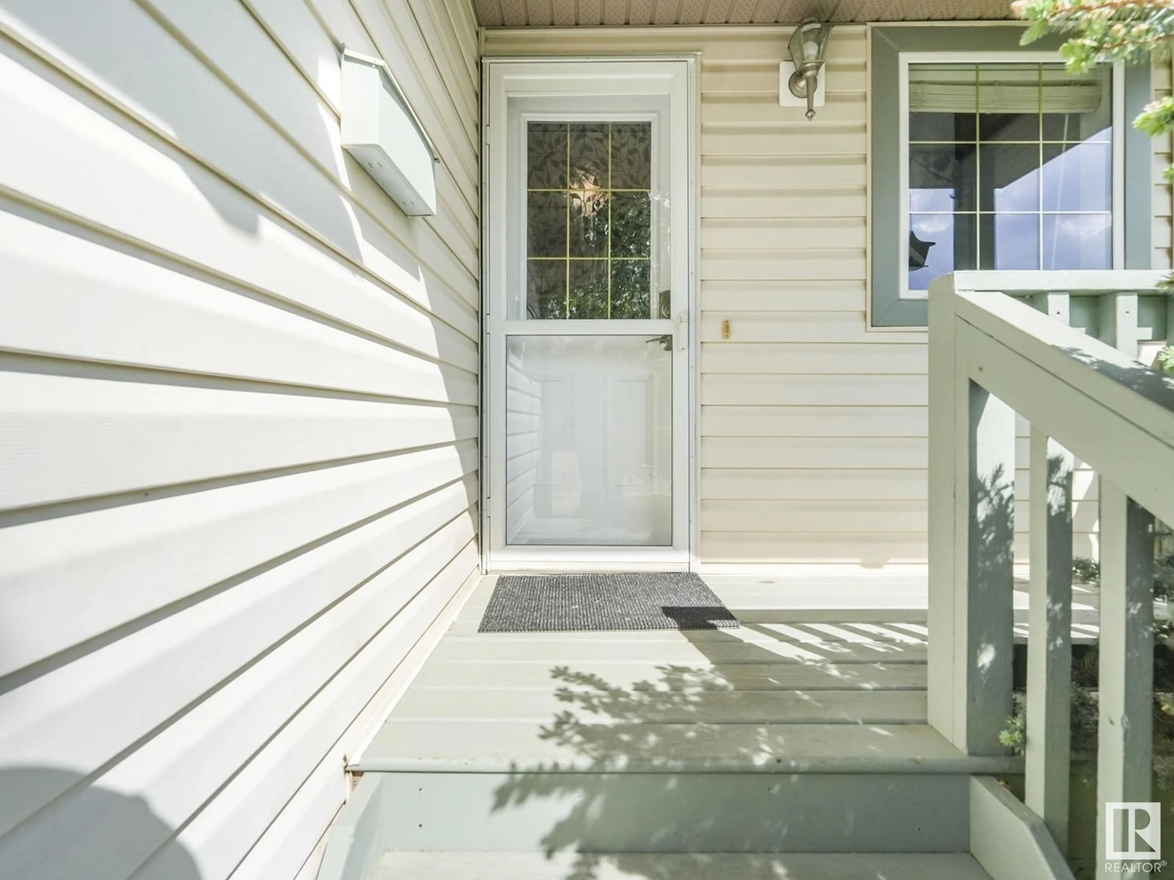 Home with vinyl exterior material, street for NW - 3747 21 ST, Edmonton Alberta T6T1R7