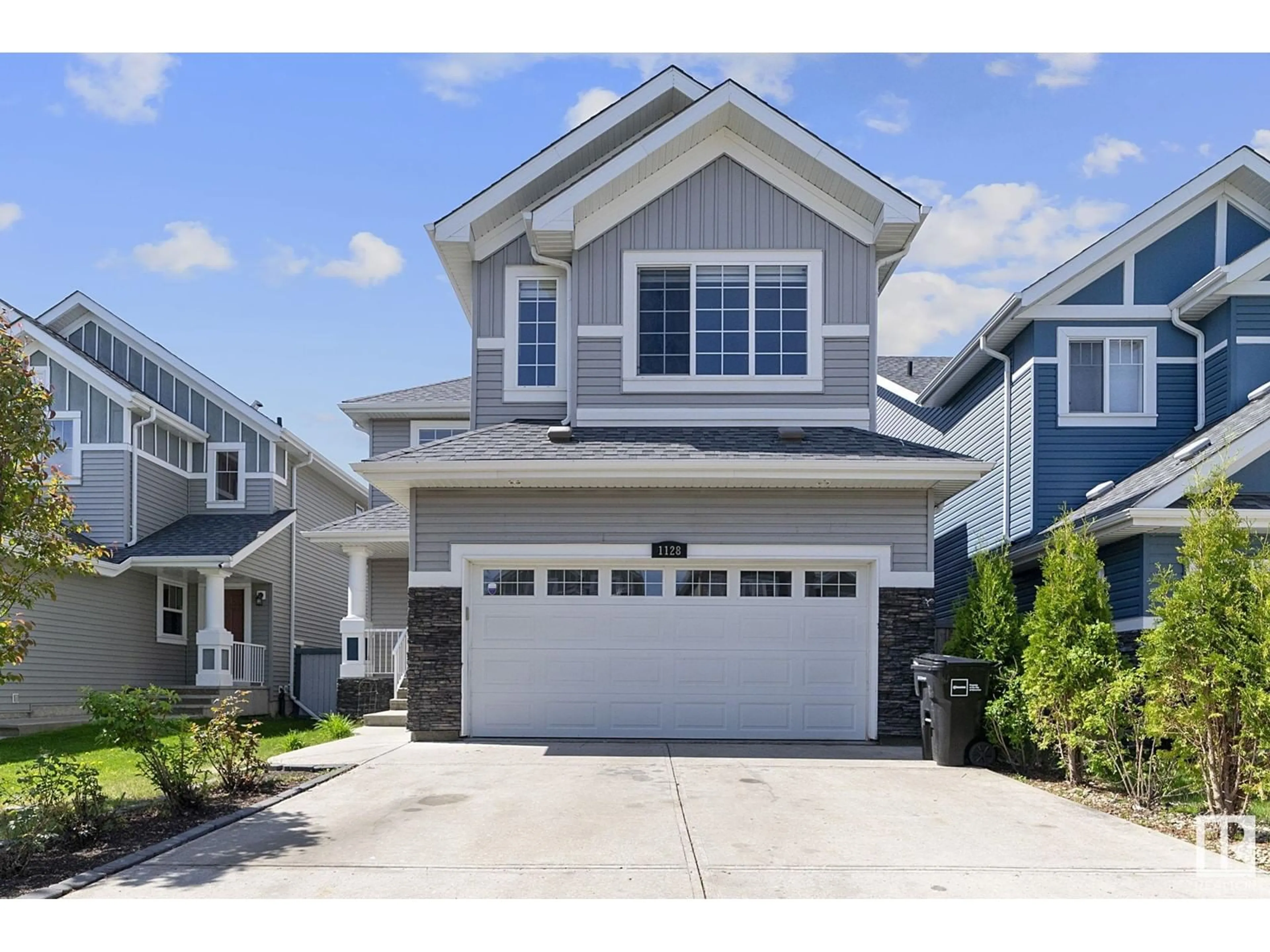 Home with vinyl exterior material, street for SW - 1128 72 ST, Edmonton Alberta T6X0N8