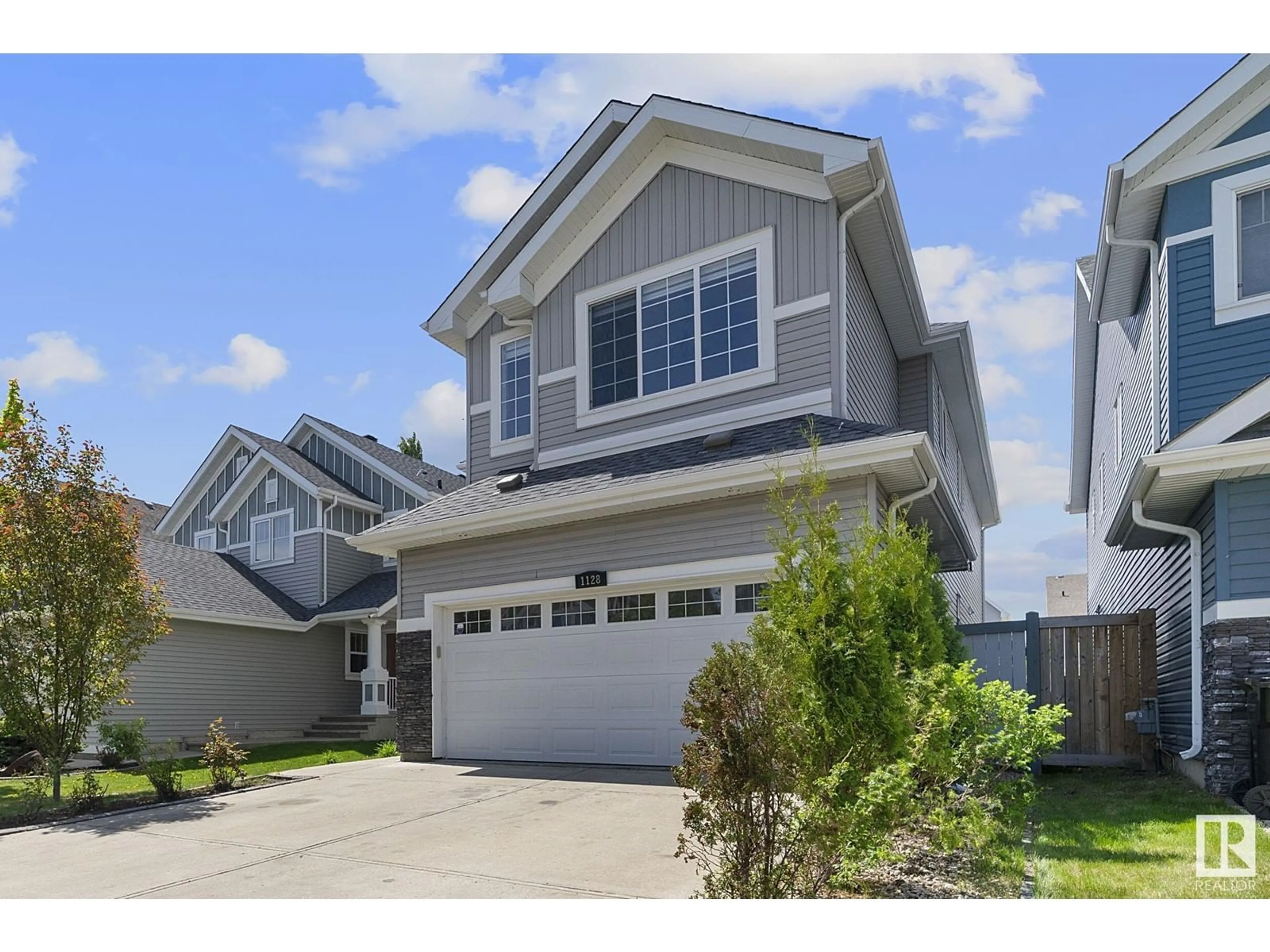 Home with vinyl exterior material, street for SW - 1128 72 ST, Edmonton Alberta T6X0N8