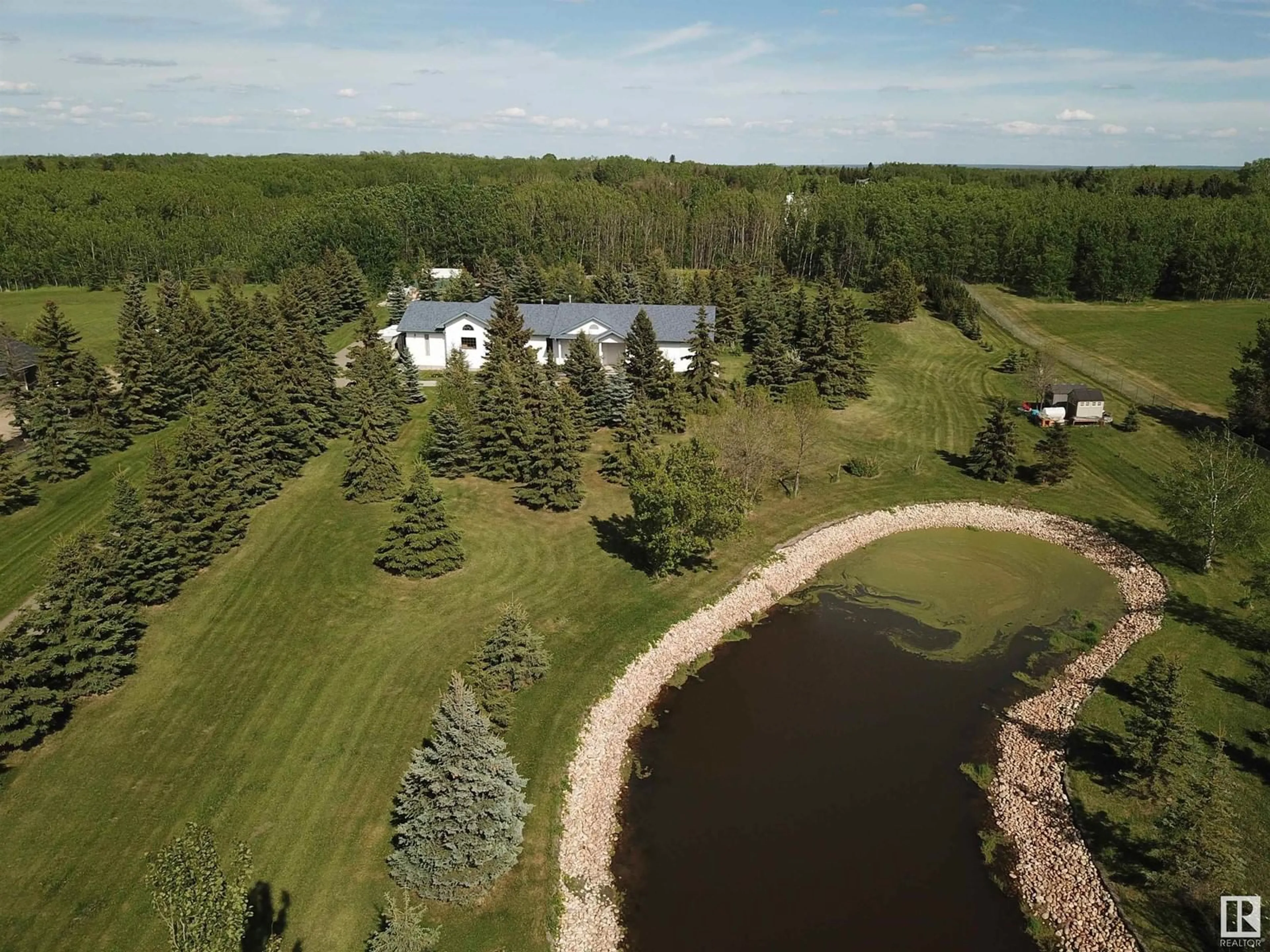 A pic from outside/outdoor area/front of a property/back of a property/a pic from drone, water/lake/river/ocean view for 361 RG RD 225, Rural Strathcona County Alberta T8C1H3