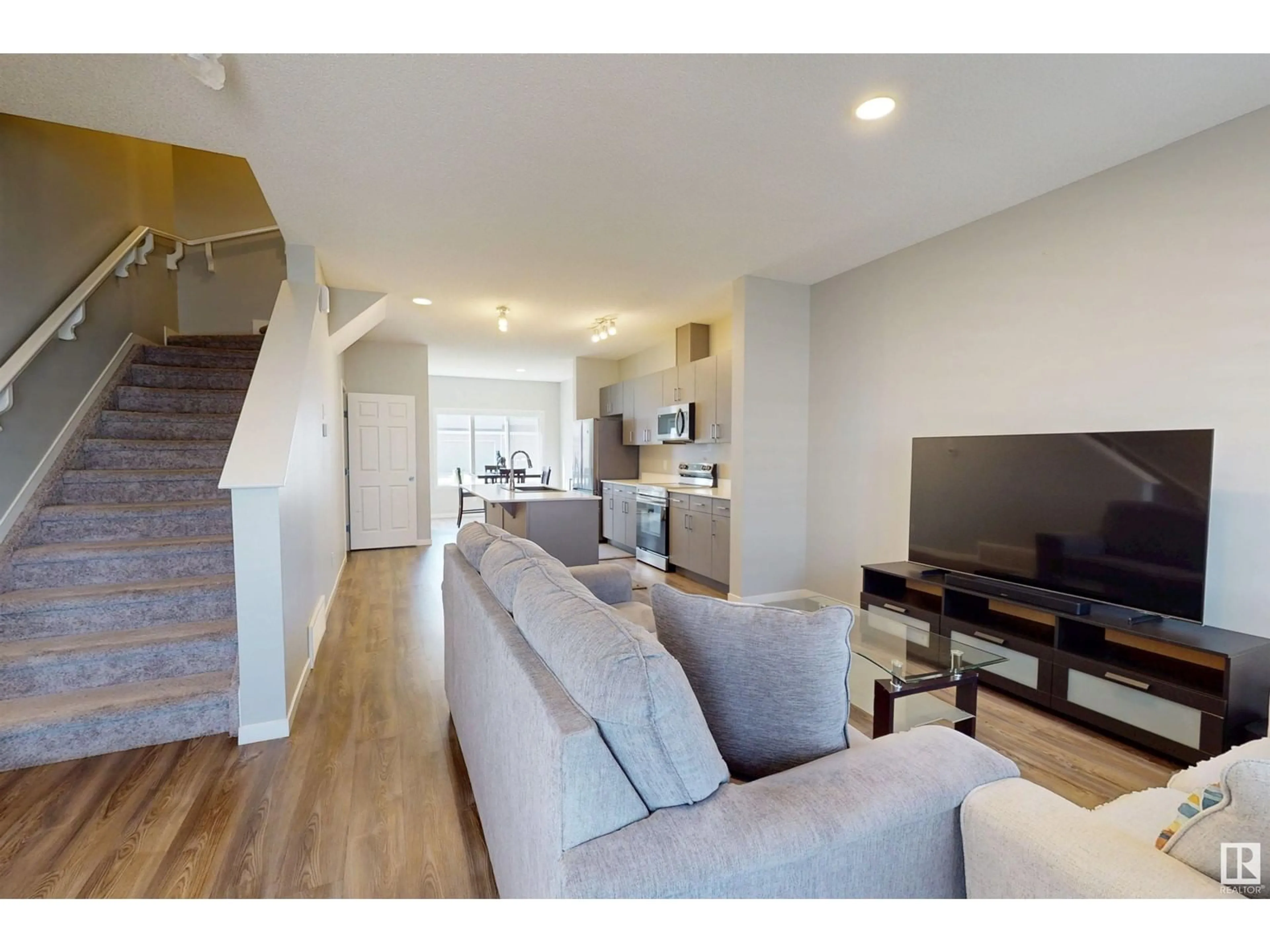Living room with furniture, unknown for 1527 16 AV, Edmonton Alberta T6T2N9