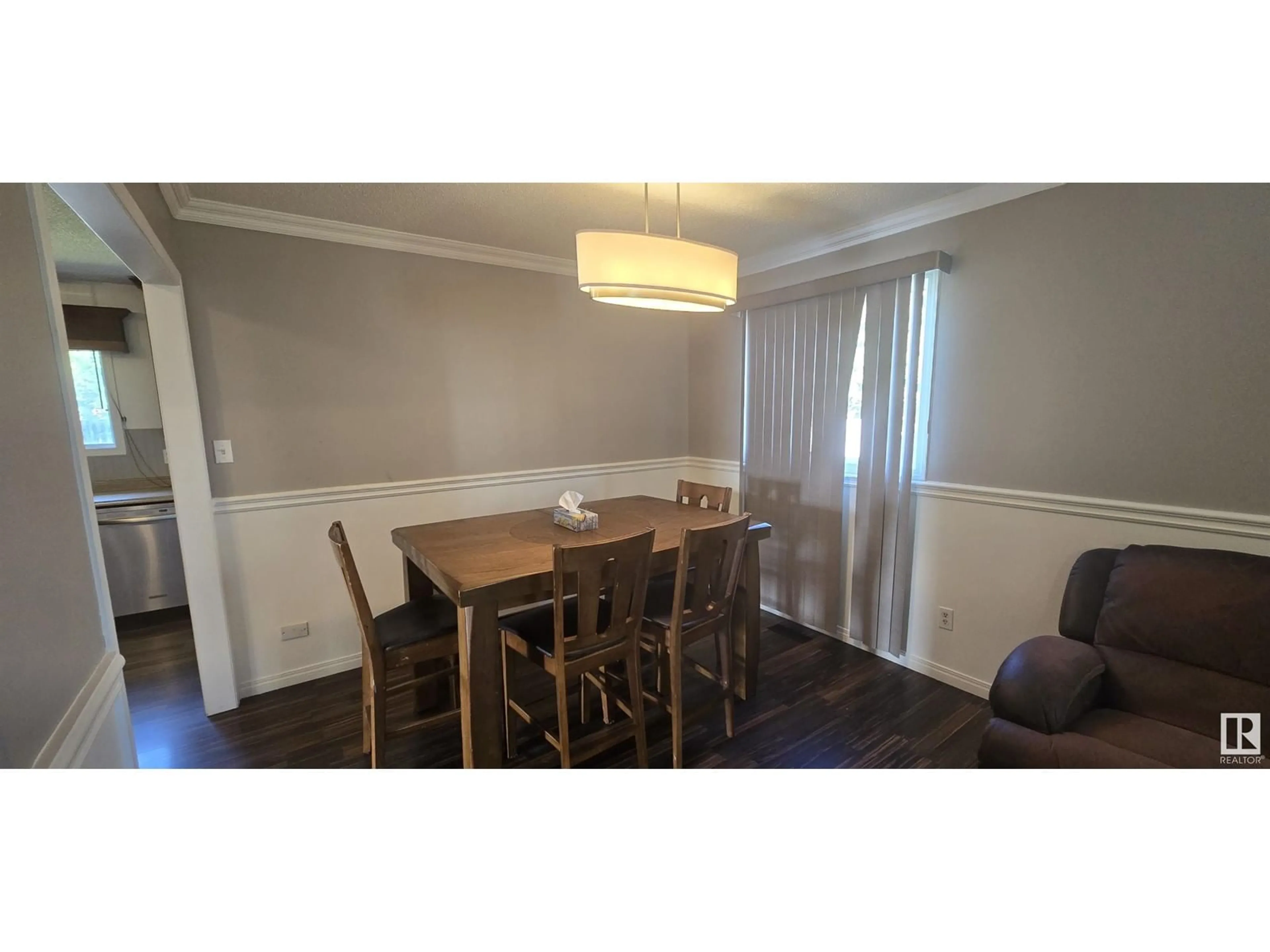 Dining room, wood/laminate floor for 2727 83 STREET, Edmonton Alberta T6K3G7