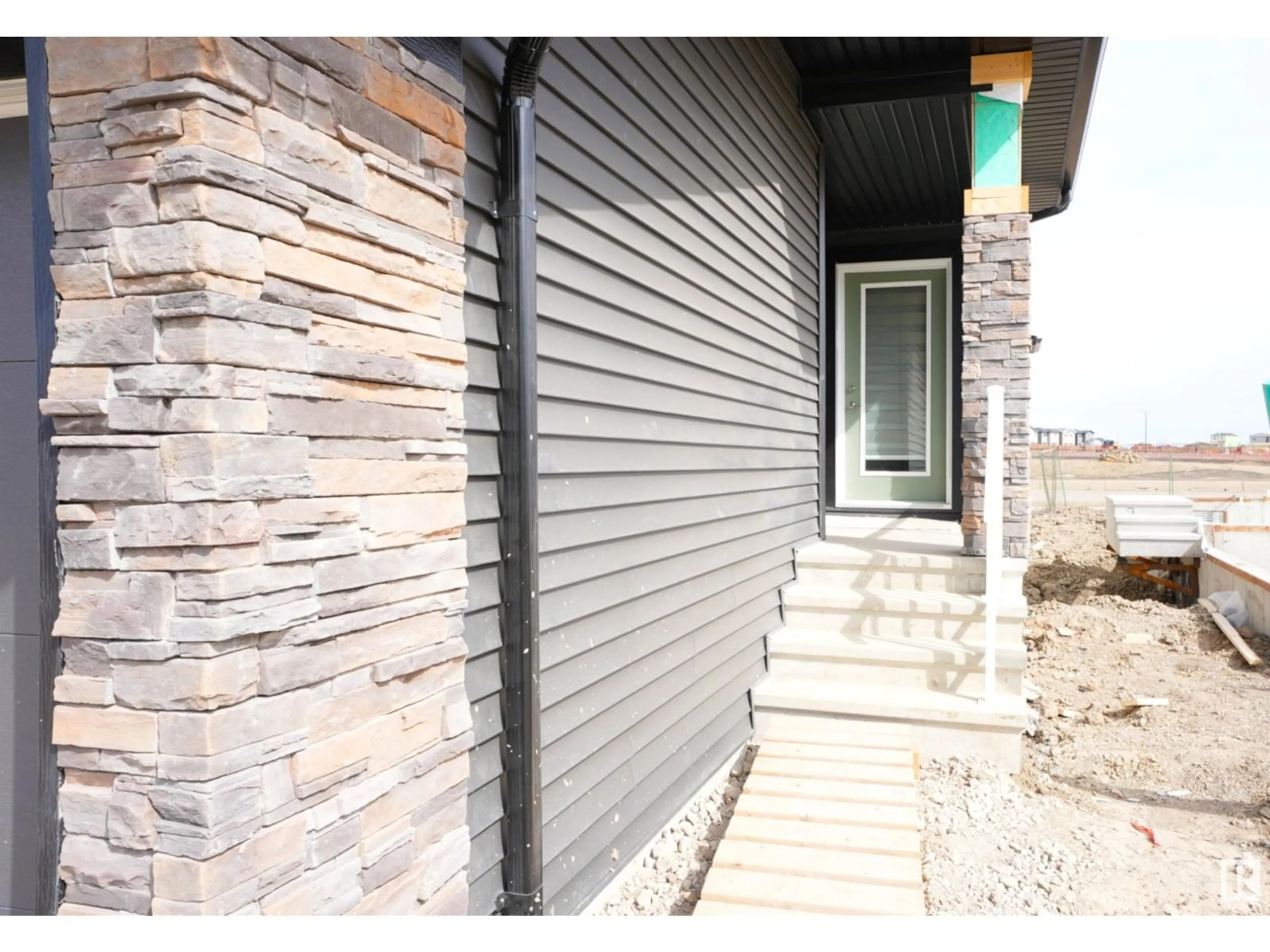 Home with vinyl exterior material, street for 2 - 2710 ST SW, Edmonton Alberta T6X3H4