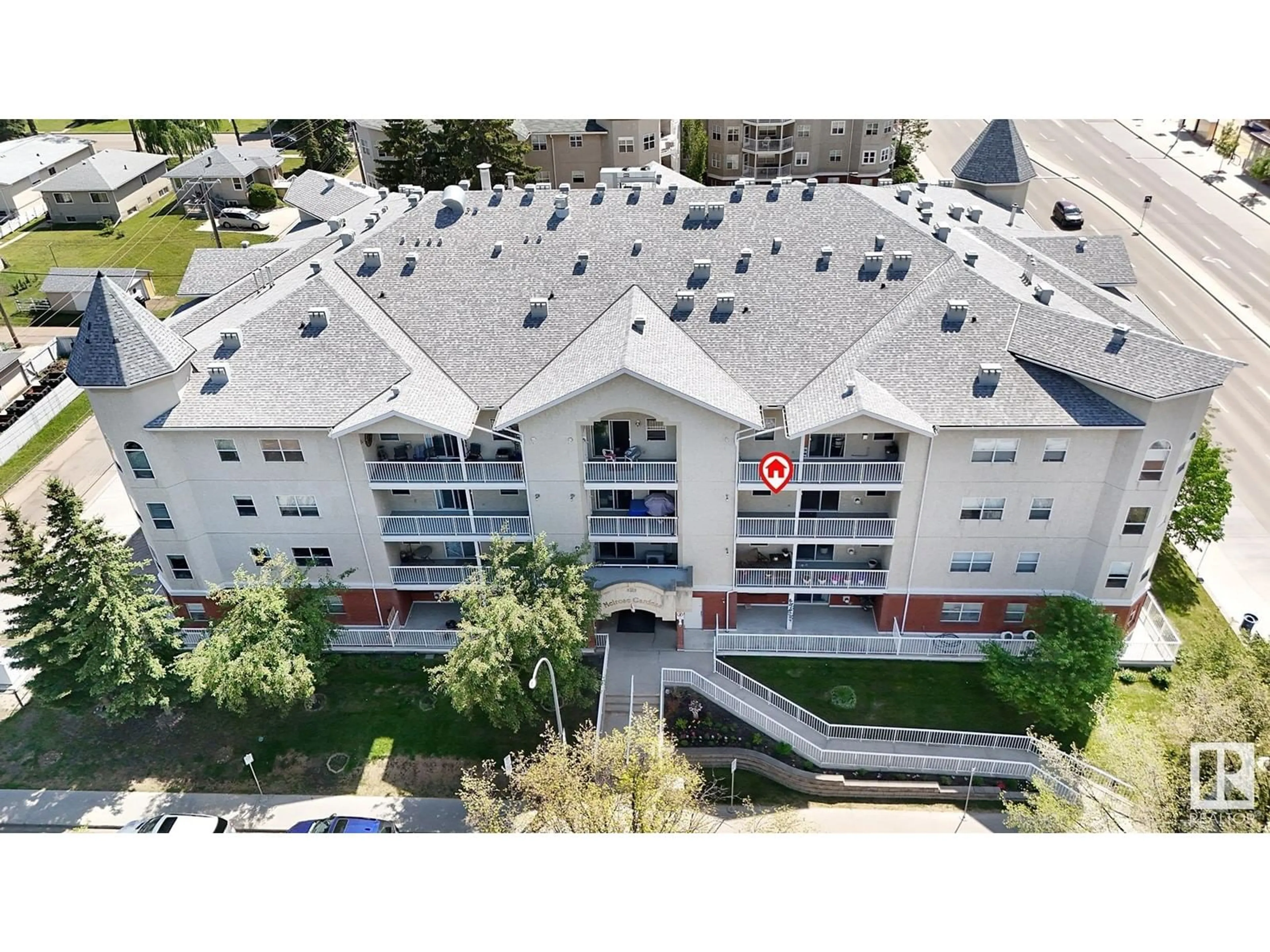 A pic from outside/outdoor area/front of a property/back of a property/a pic from drone, building for #302 - 8215 84 AV, Edmonton Alberta T6C4R2