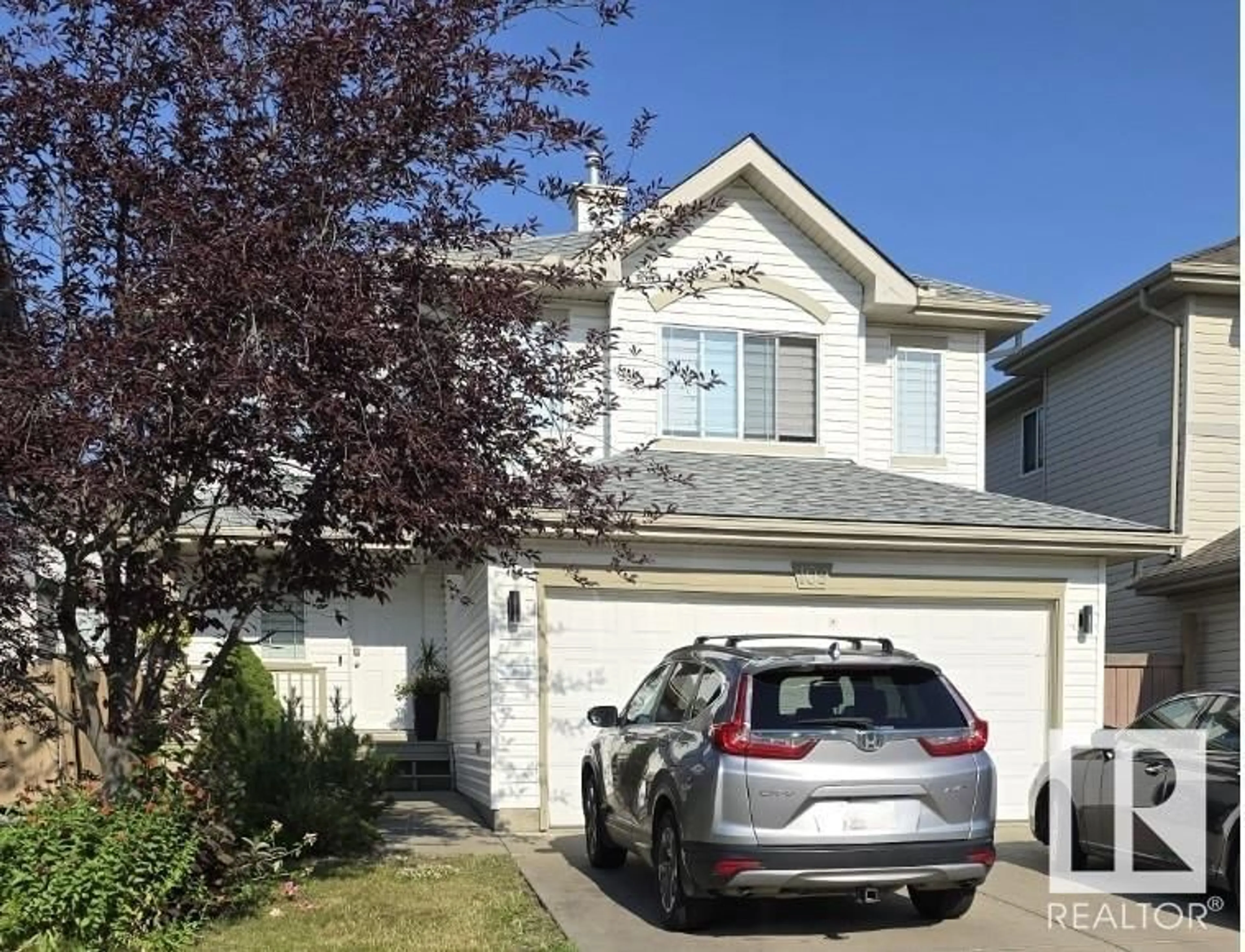 Home with vinyl exterior material, street for 109 HAYWARD CR, Edmonton Alberta T6R3G2