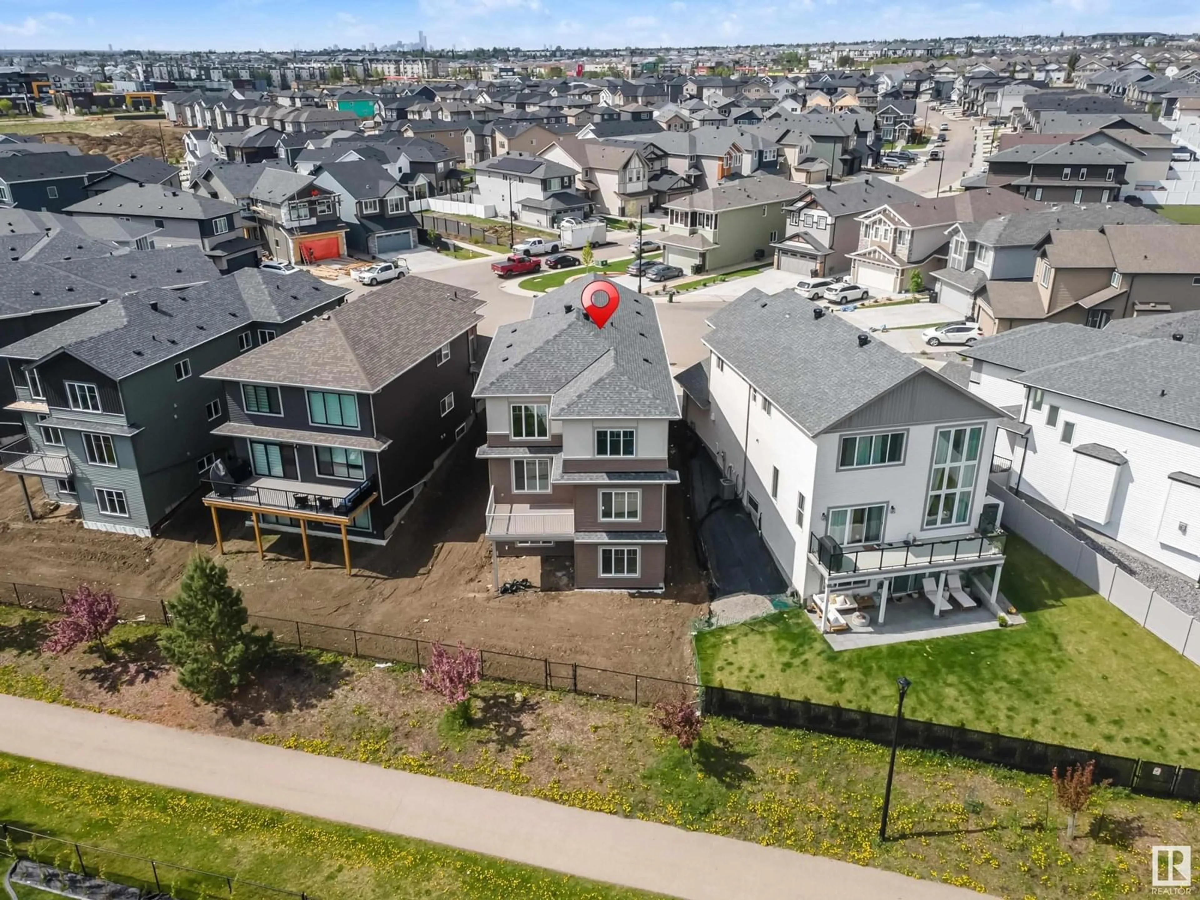 A pic from outside/outdoor area/front of a property/back of a property/a pic from drone, unknown for NW - 17055 45 ST, Edmonton Alberta T5Y4C9