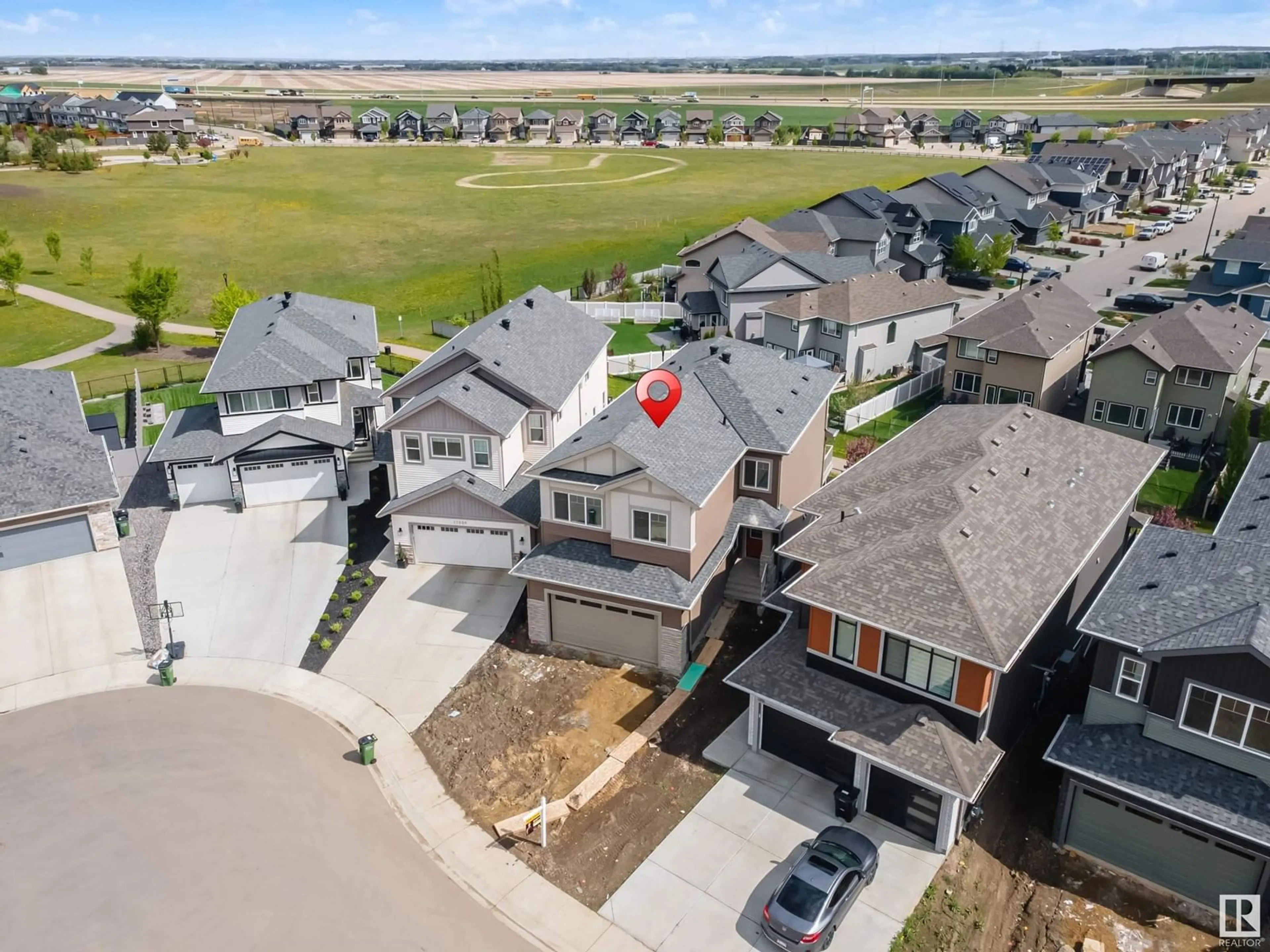 A pic from outside/outdoor area/front of a property/back of a property/a pic from drone, mountain view for NW - 17055 45 ST, Edmonton Alberta T5Y4C9