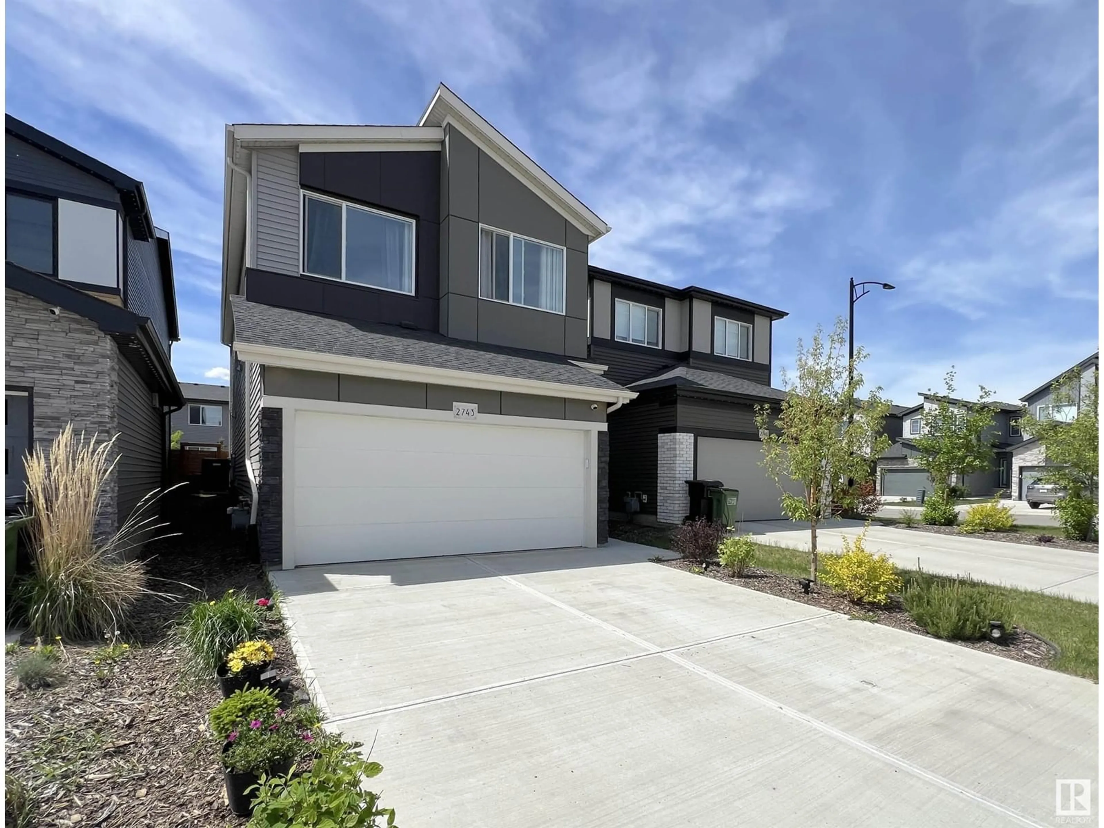 A pic from outside/outdoor area/front of a property/back of a property/a pic from drone, street for 2743 KOSHAL PL, Edmonton Alberta T6W1A5