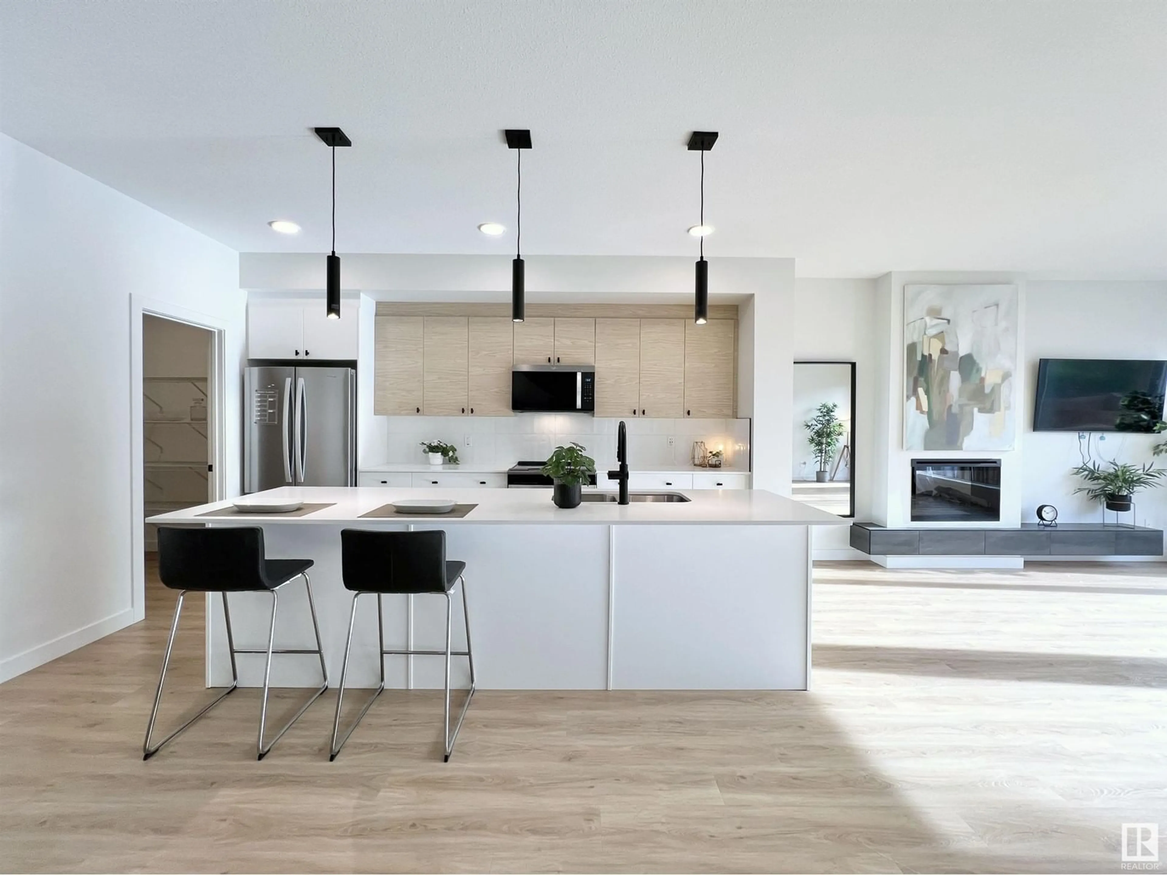 Open concept kitchen, wood/laminate floor for 2743 KOSHAL PL, Edmonton Alberta T6W1A5
